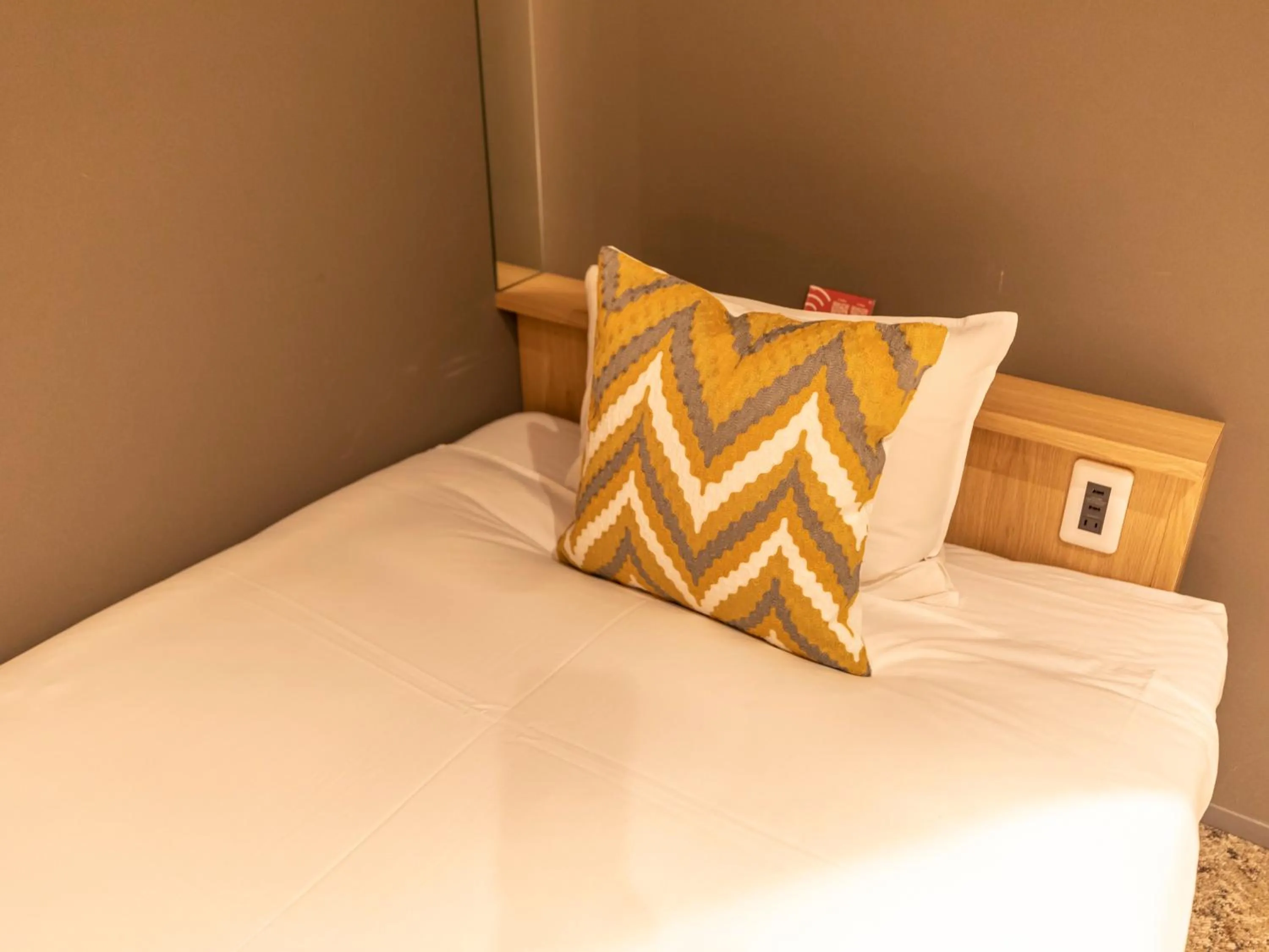 Bed in Hale Kyoto Tambaguchi Umekoji Park North