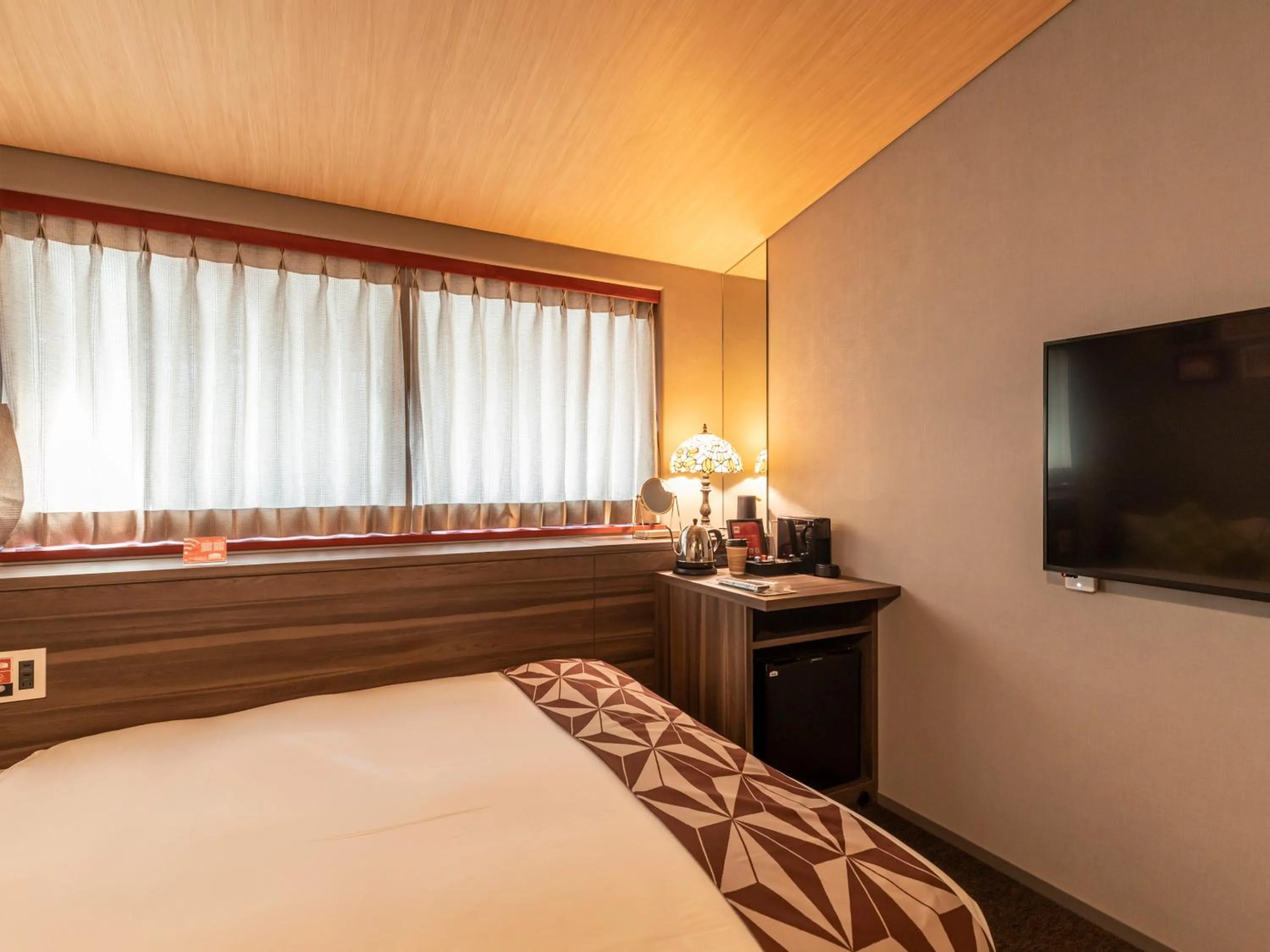 Bed in HALE Kyoto Toji