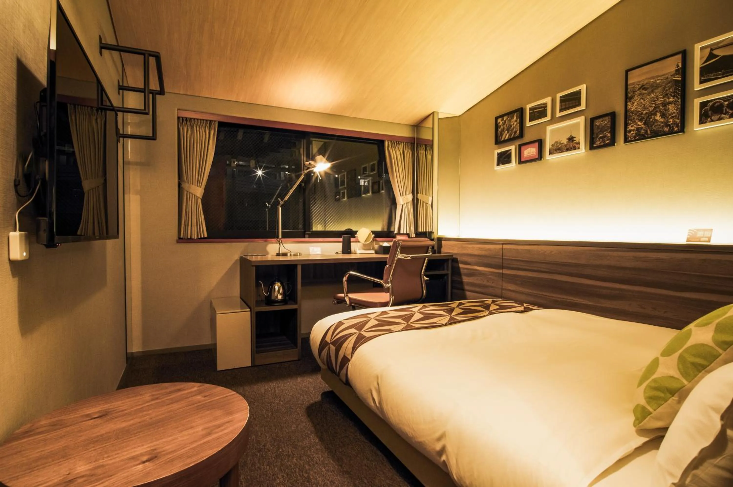 Bed in HALE Kyoto Toji