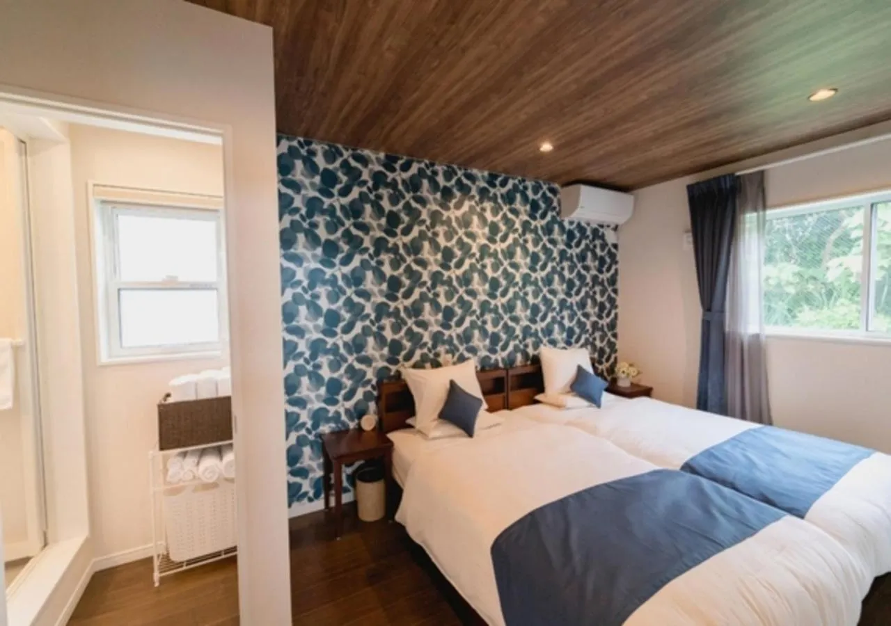 Bed in BEVERLY HILLS VILLA Miyakojima Resort