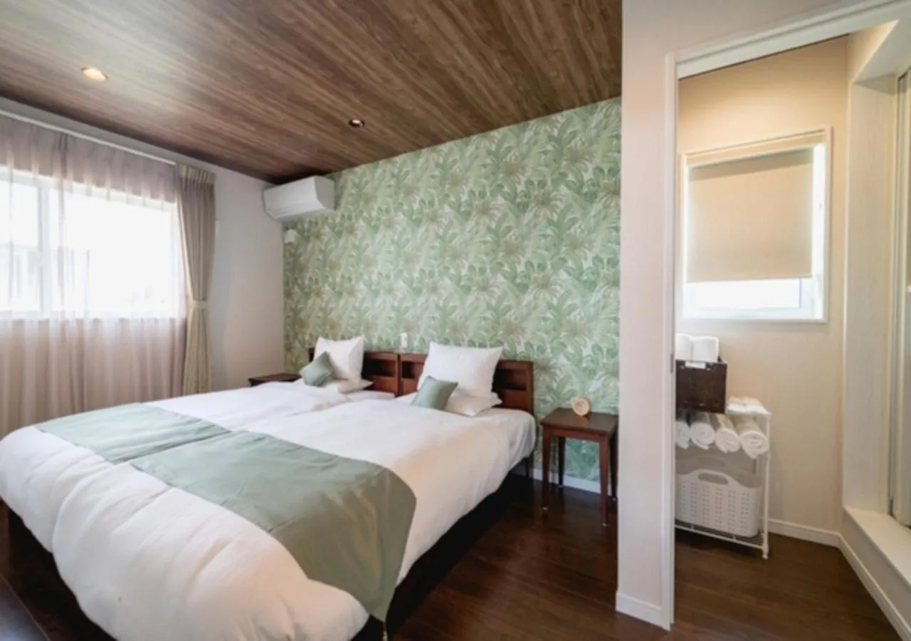 Bed in BEVERLY HILLS VILLA Miyakojima Resort