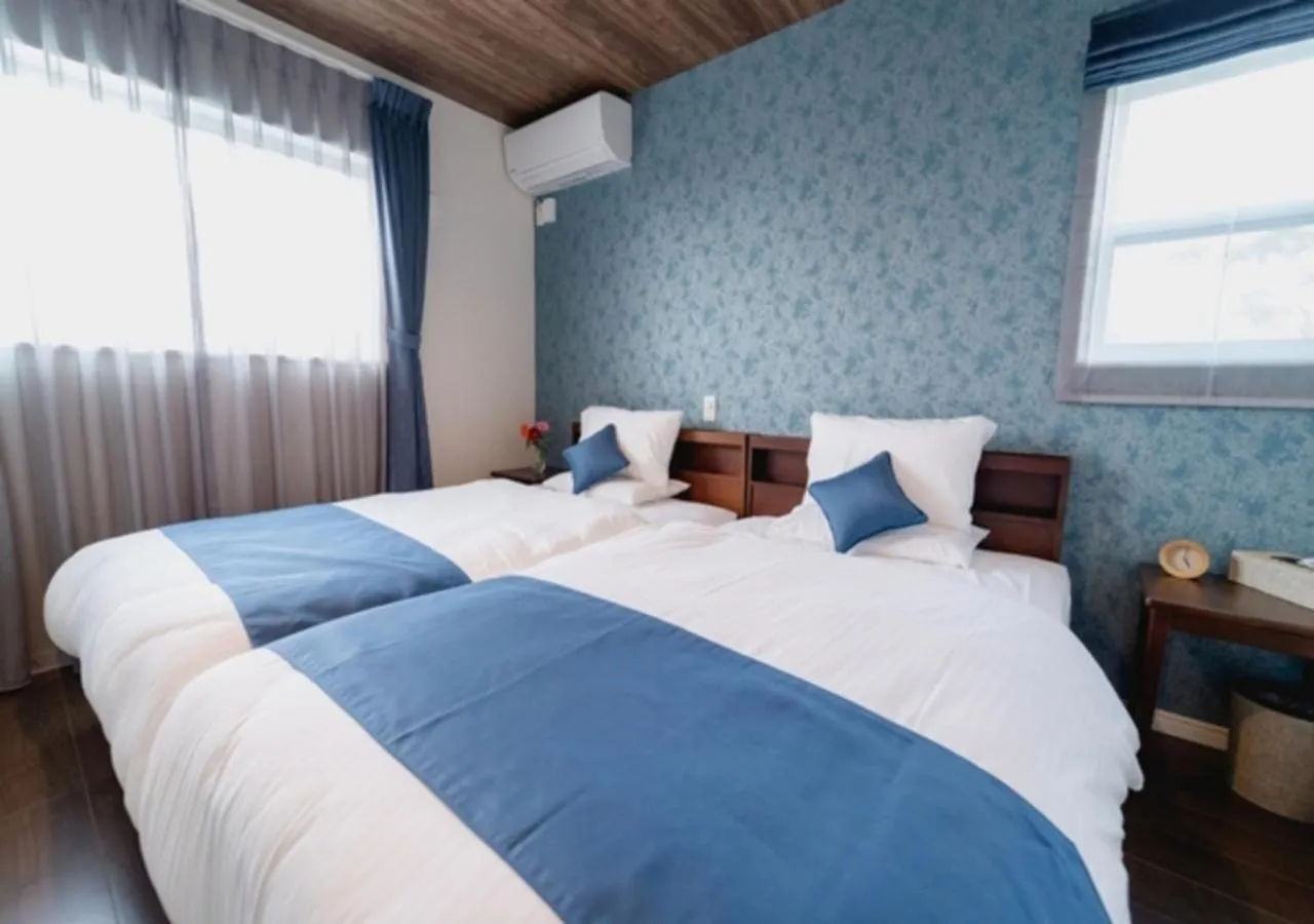 Bed in BEVERLY HILLS VILLA Miyakojima Resort