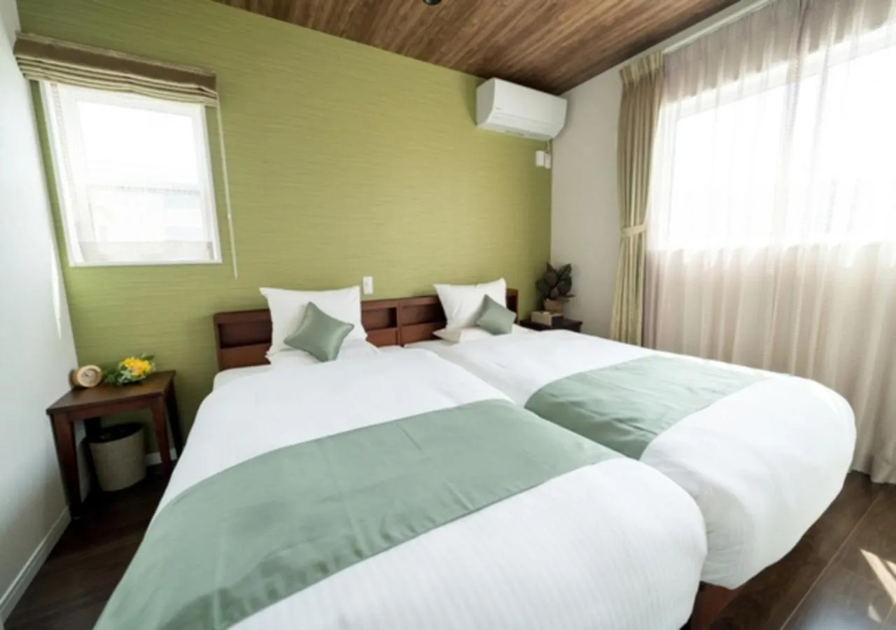 Bed in BEVERLY HILLS VILLA Miyakojima Resort