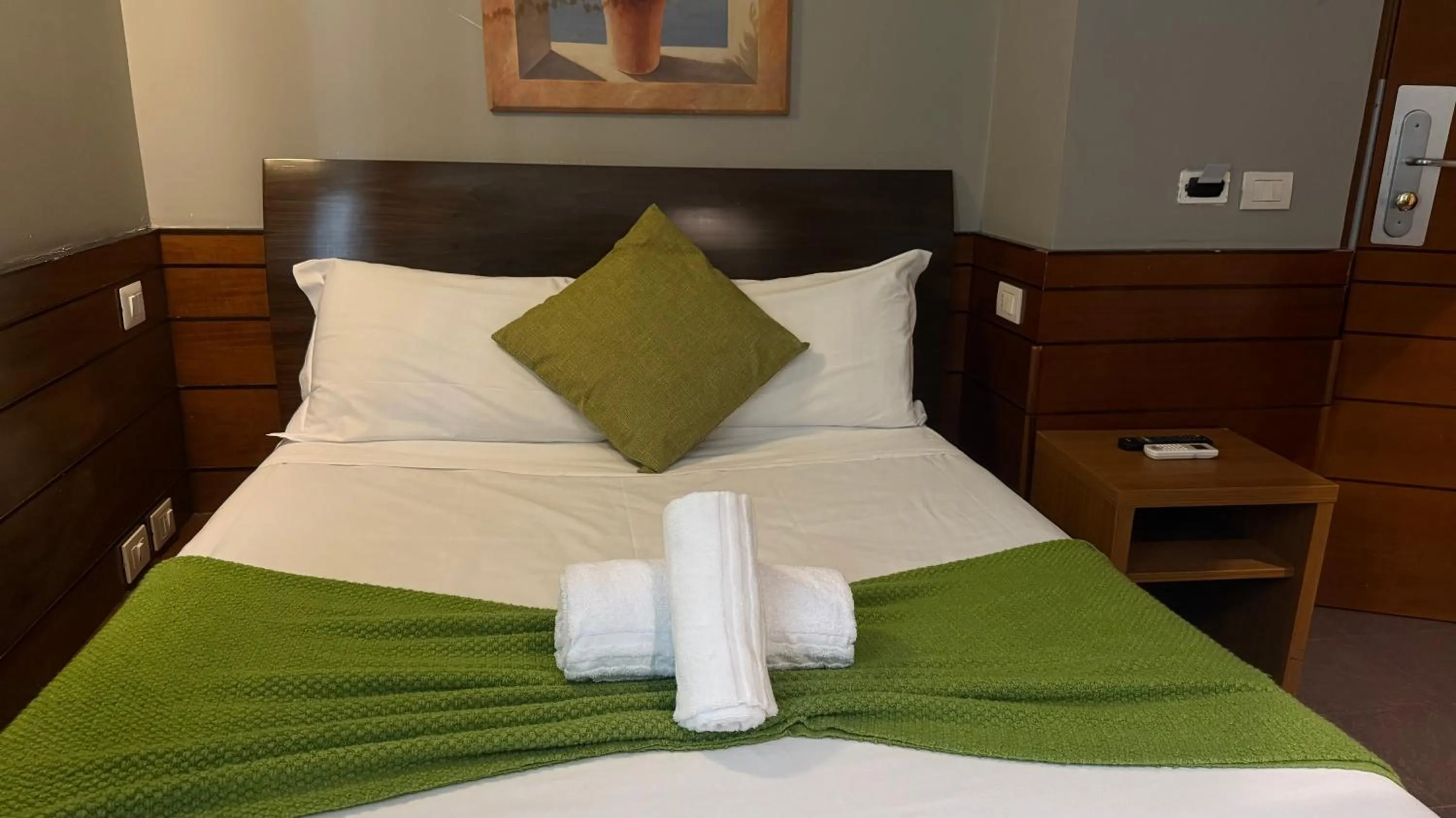 Bed in Romalive Hotel