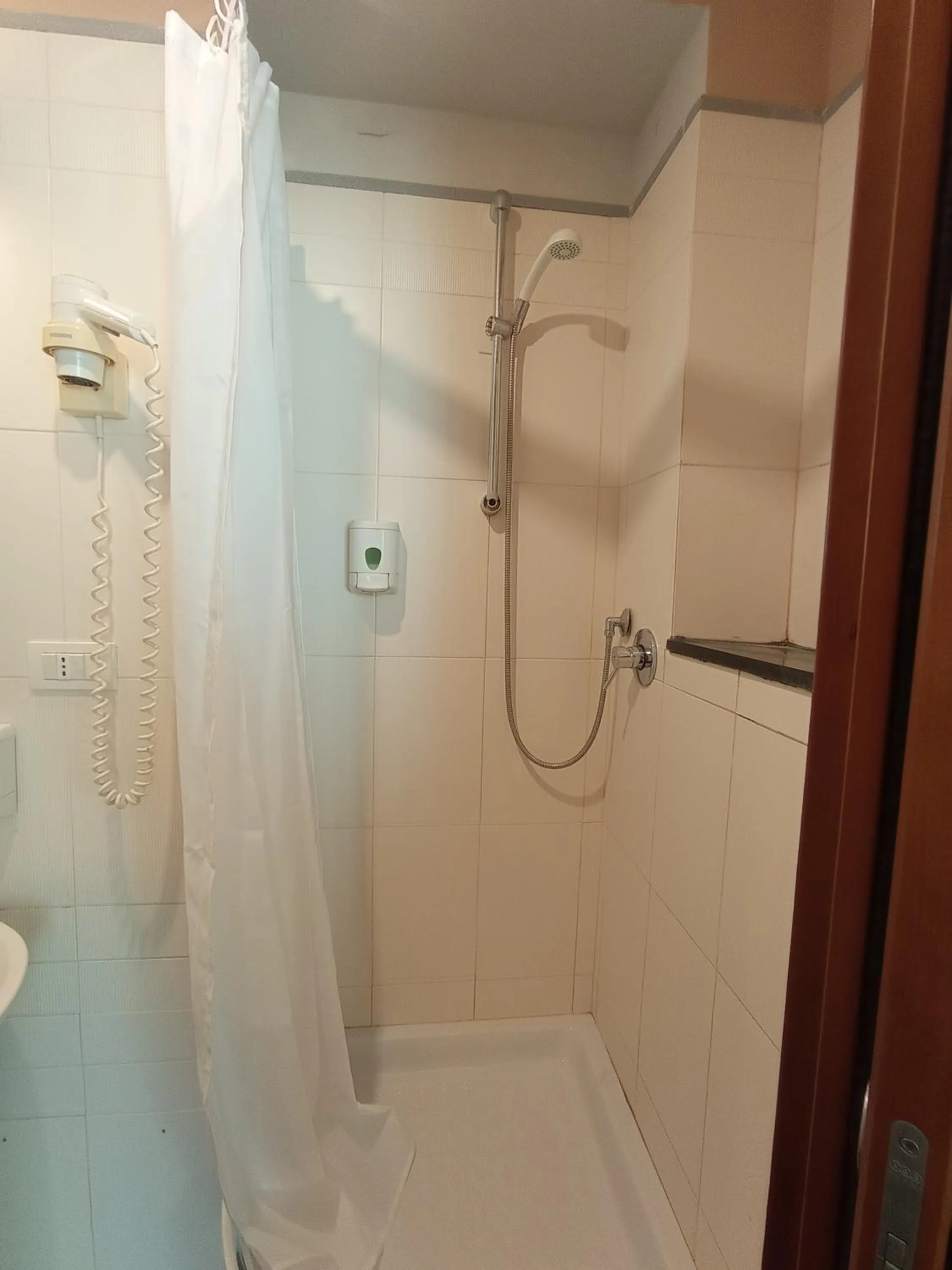 Shower in Romalive Hotel
