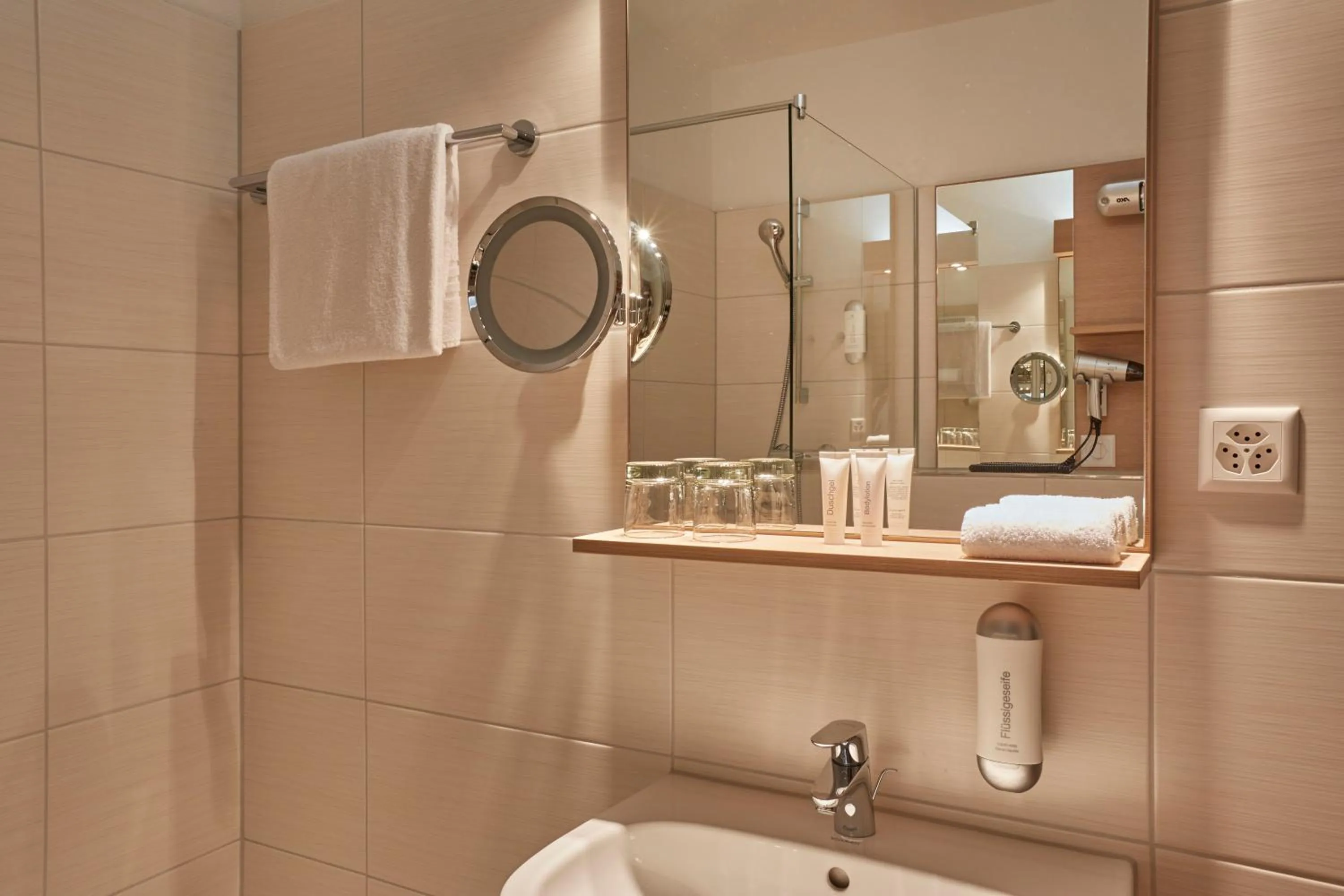 Bathroom in H4 Hotel Arcadia Locarno