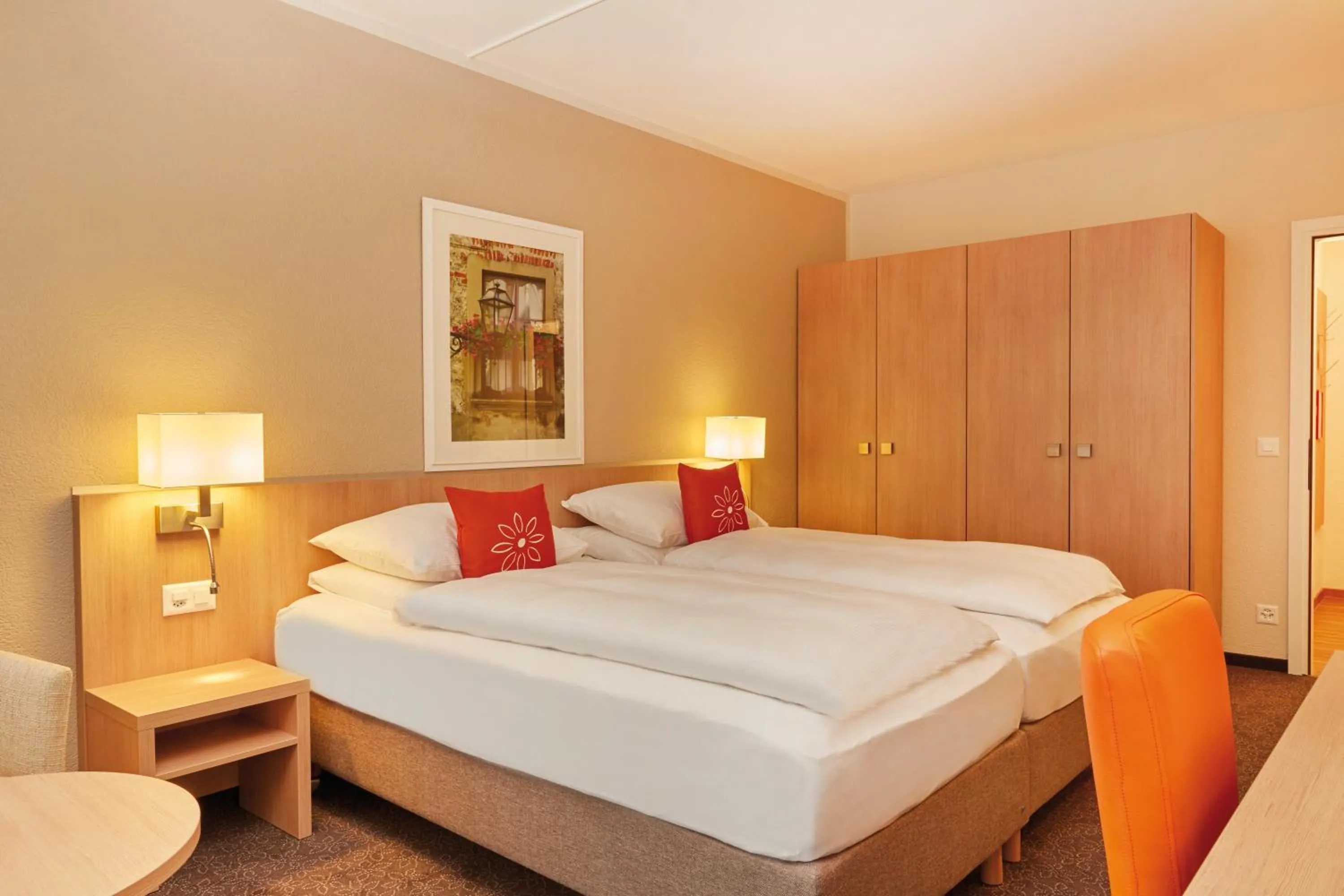 Photo of the whole room, Bed in H4 Hotel Arcadia Locarno