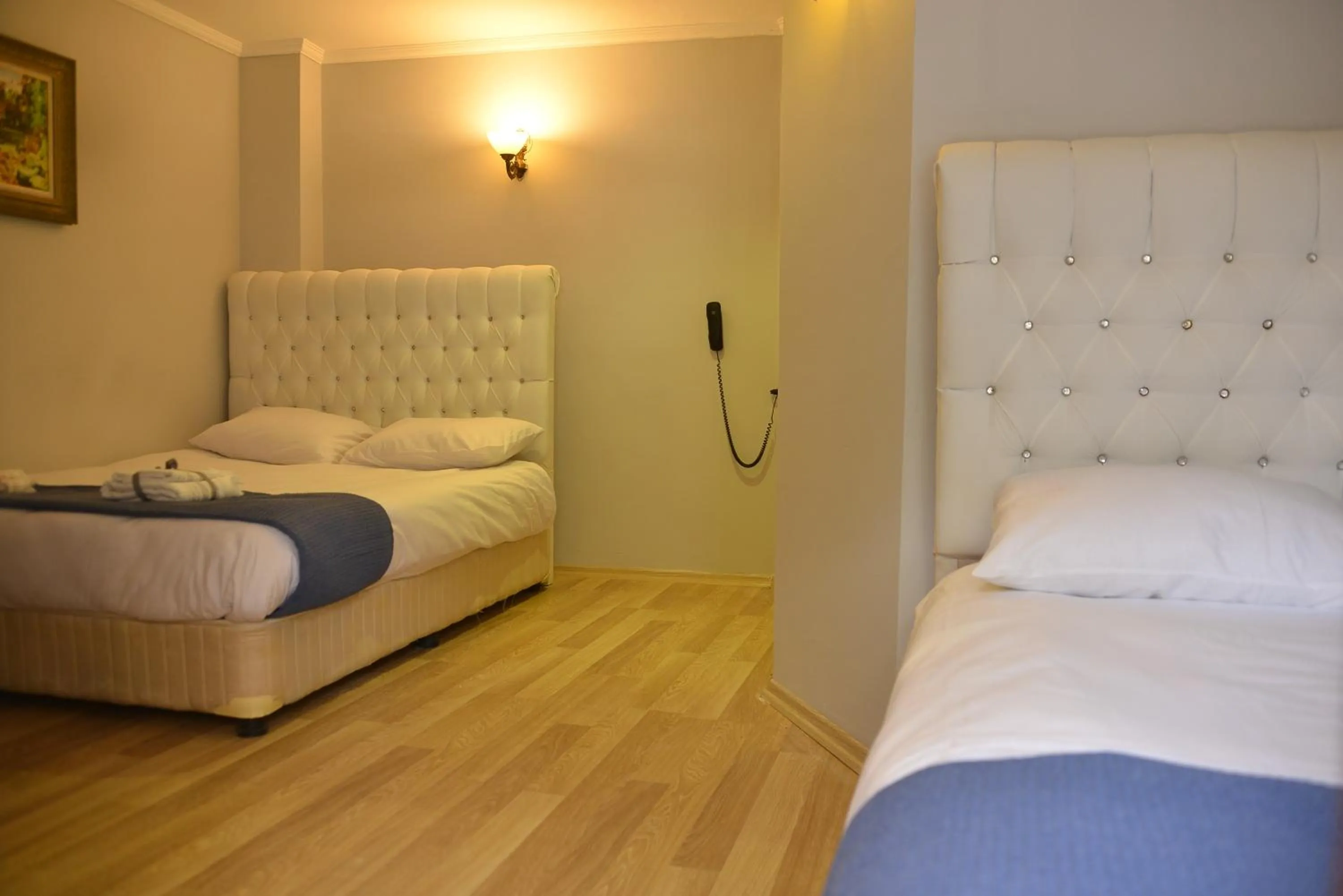 Bed in Pure Diamond Hotel