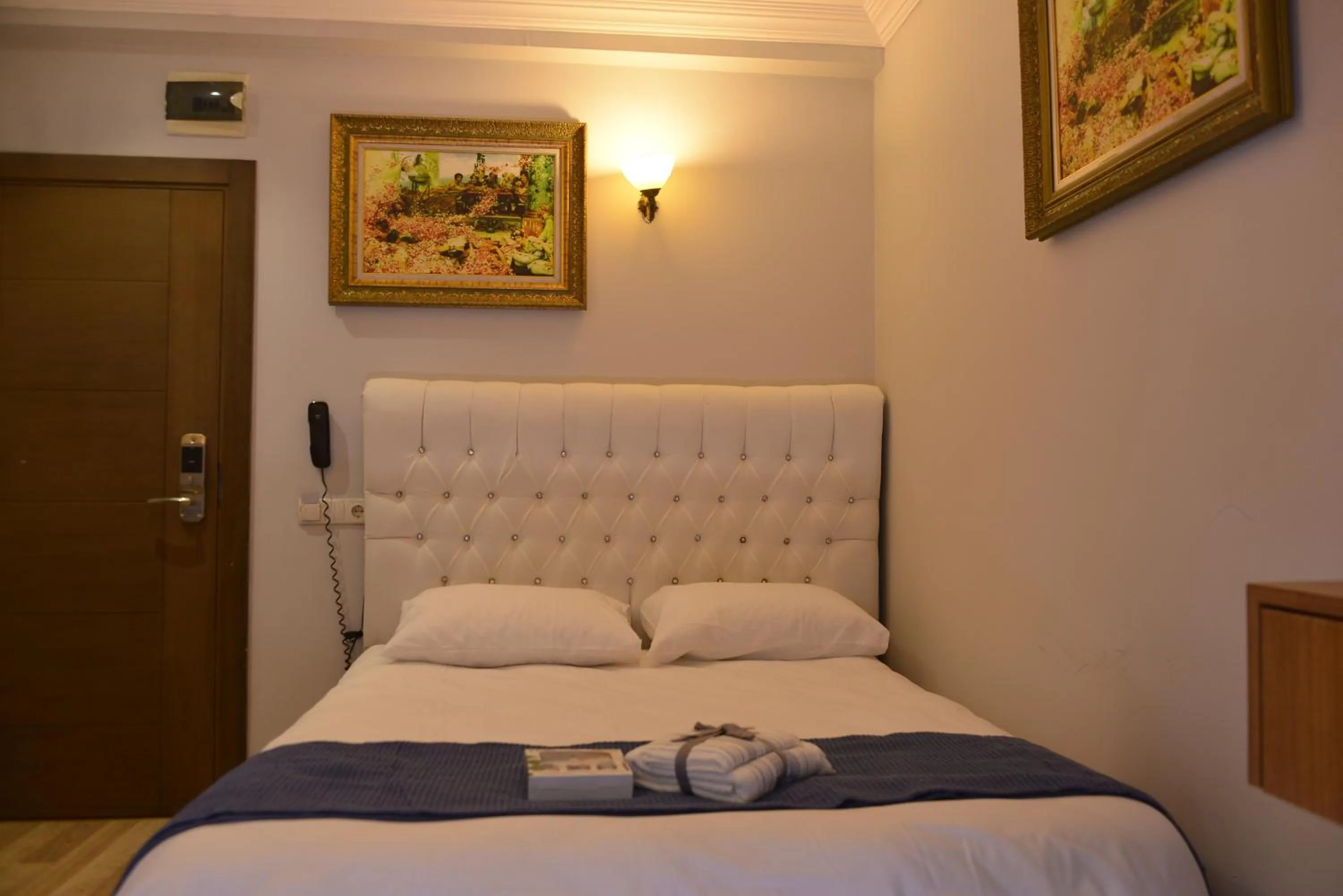 Bed in Pure Diamond Hotel