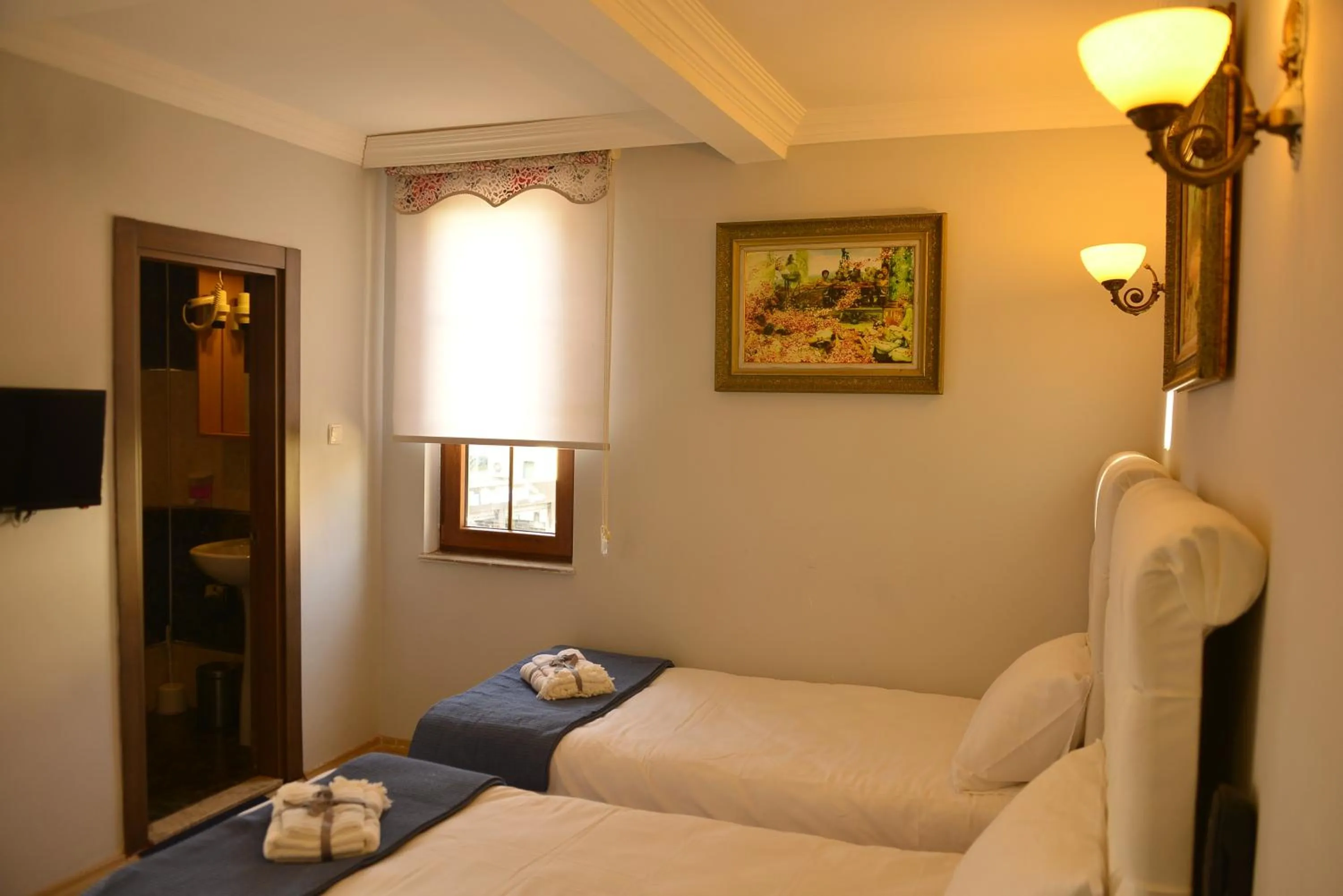 Bed in Pure Diamond Hotel