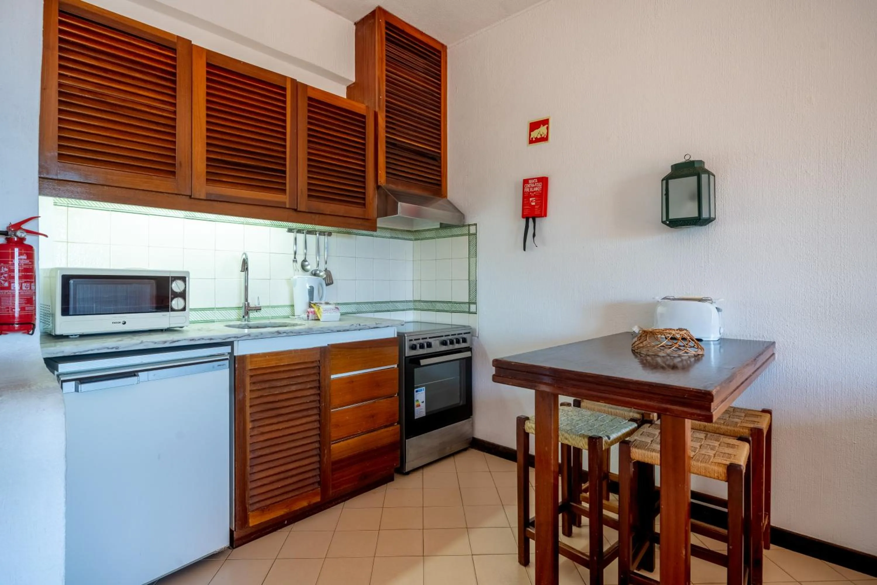 Kitchen or kitchenette in Bellavista Jardim By BeGuest