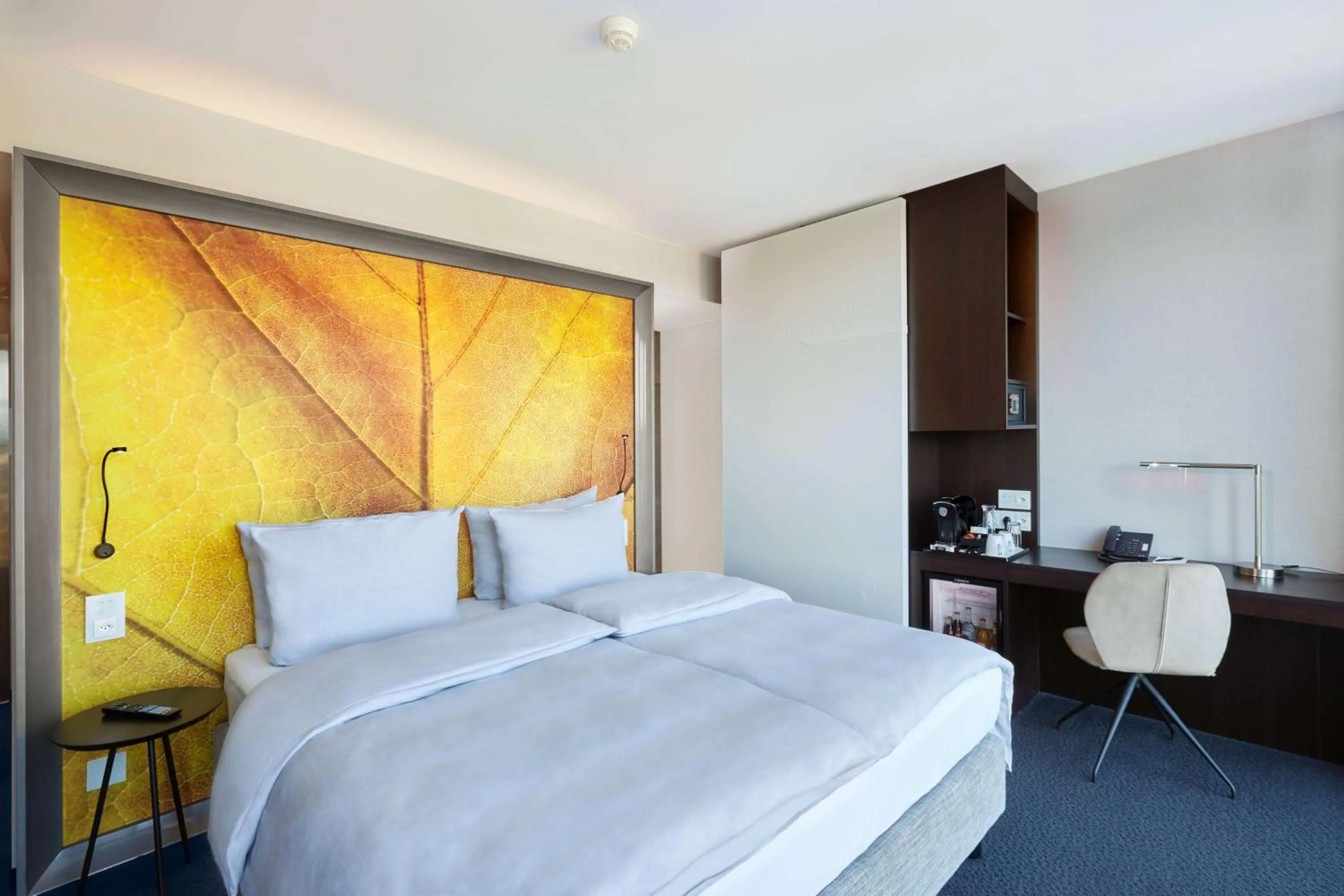 Photo of the whole room, Bed in HYPERION Hotel Basel