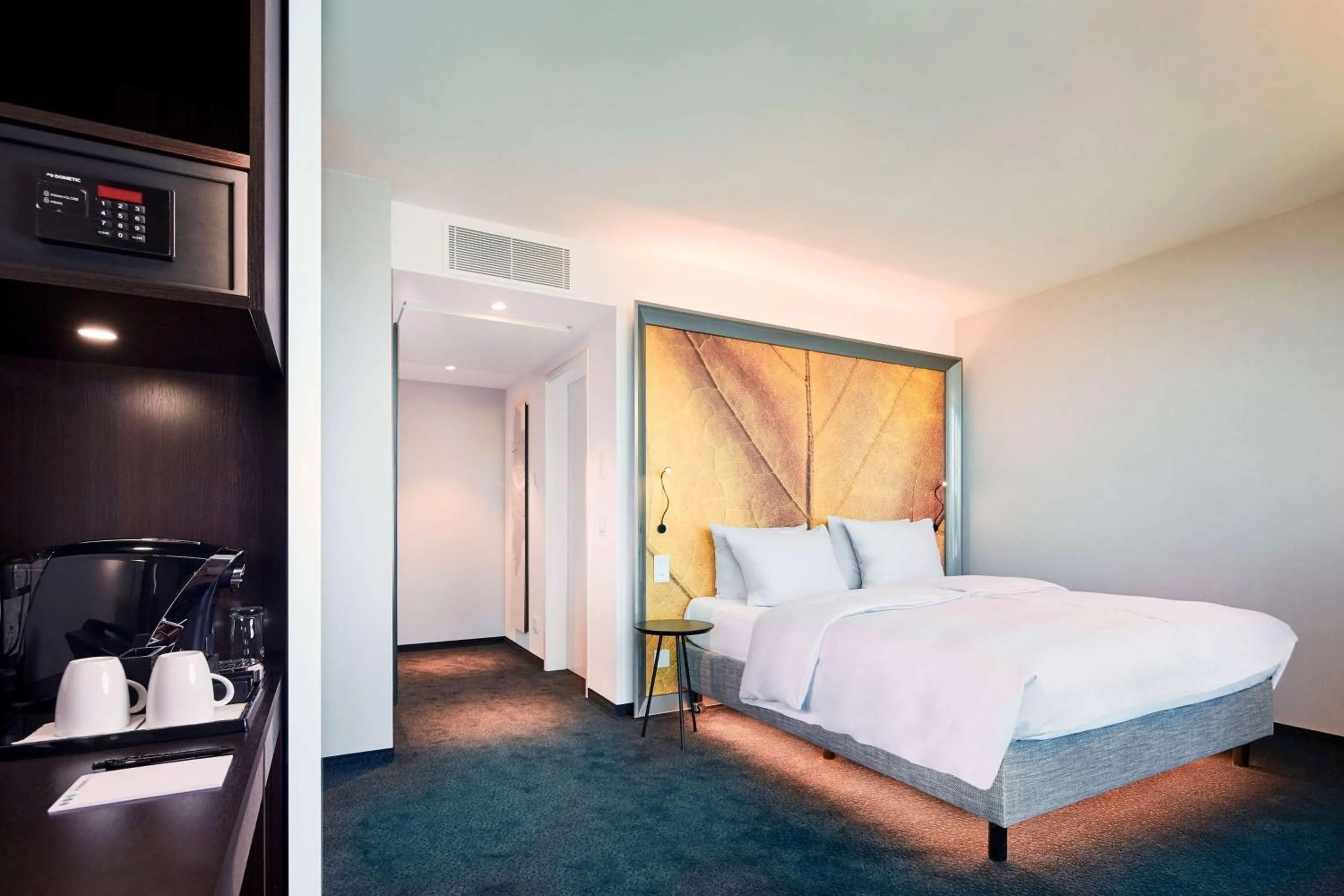 Photo of the whole room, Bed in HYPERION Hotel Basel