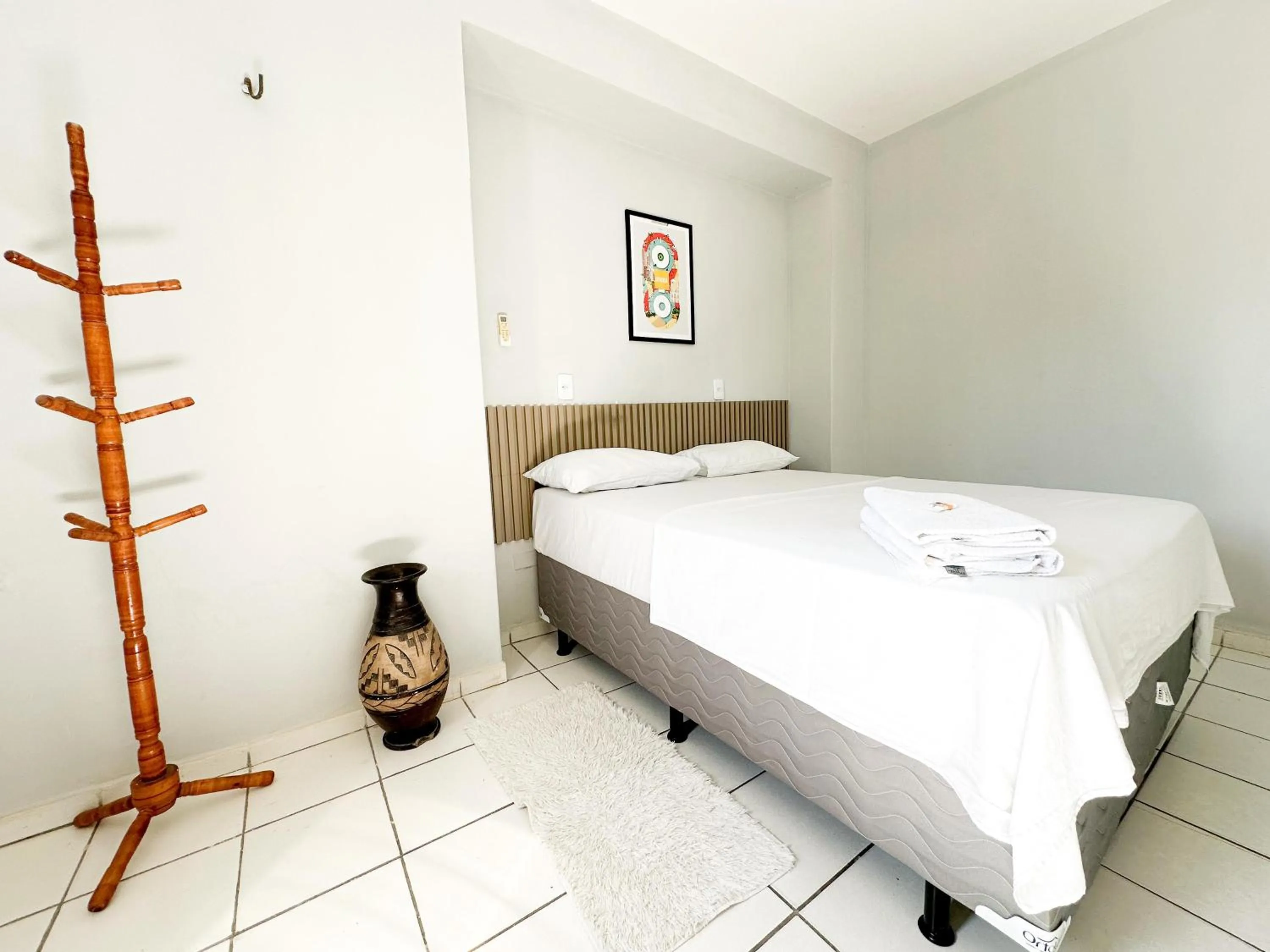 Property building, Bed in Hotel Oiticica