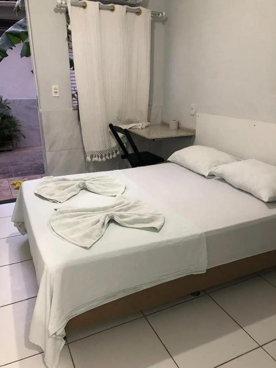 Bed in Hotel Oiticica