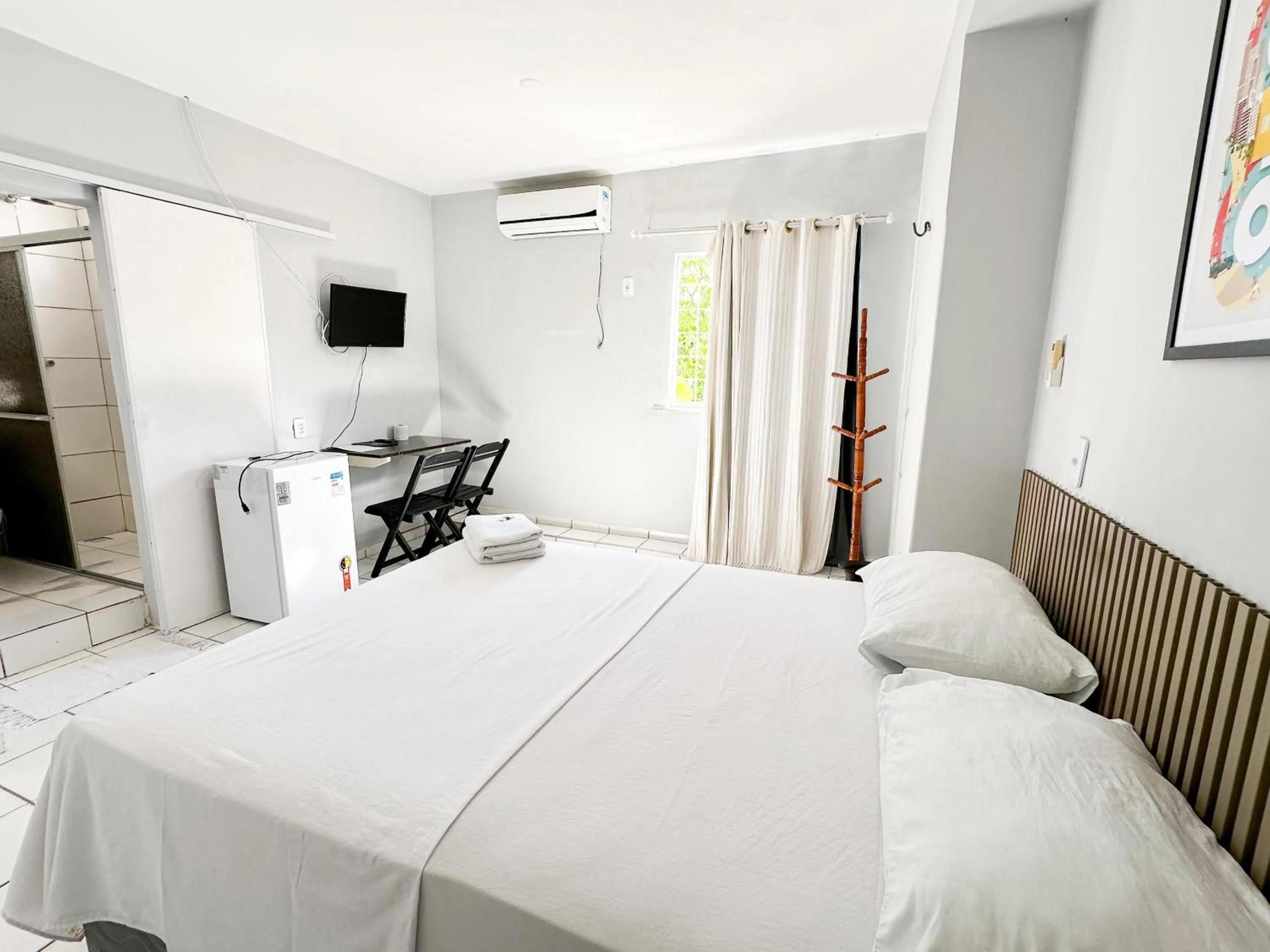 Bed in Hotel Oiticica