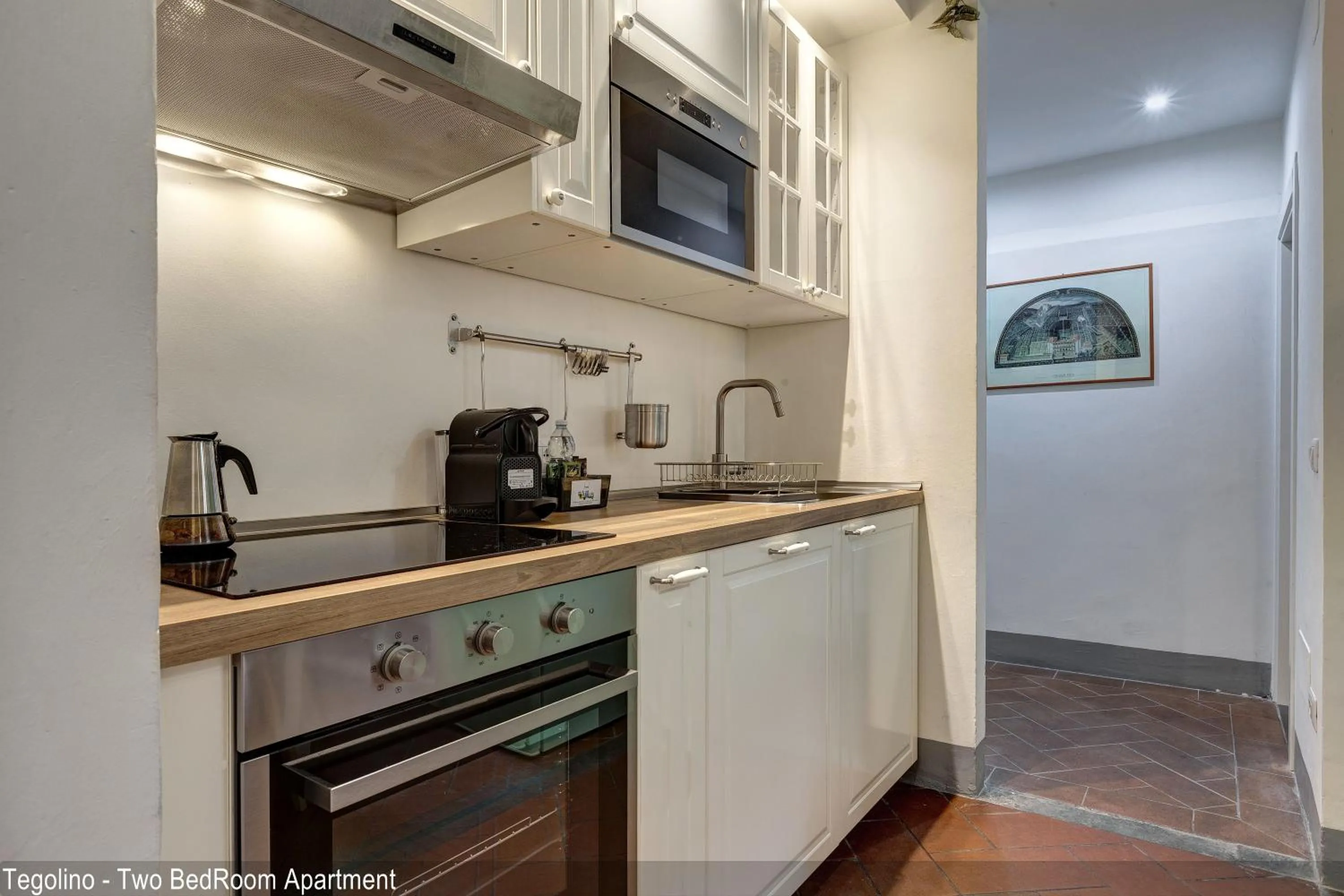 Kitchen or kitchenette in Tegolaio Apartments by Mamo Florence