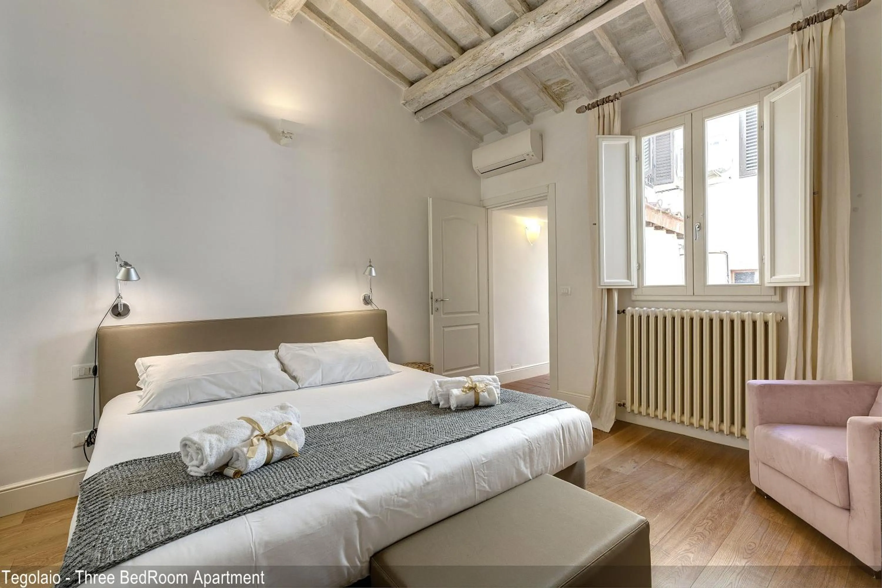 Bedroom, Bed in Tegolaio Apartments by Mamo Florence
