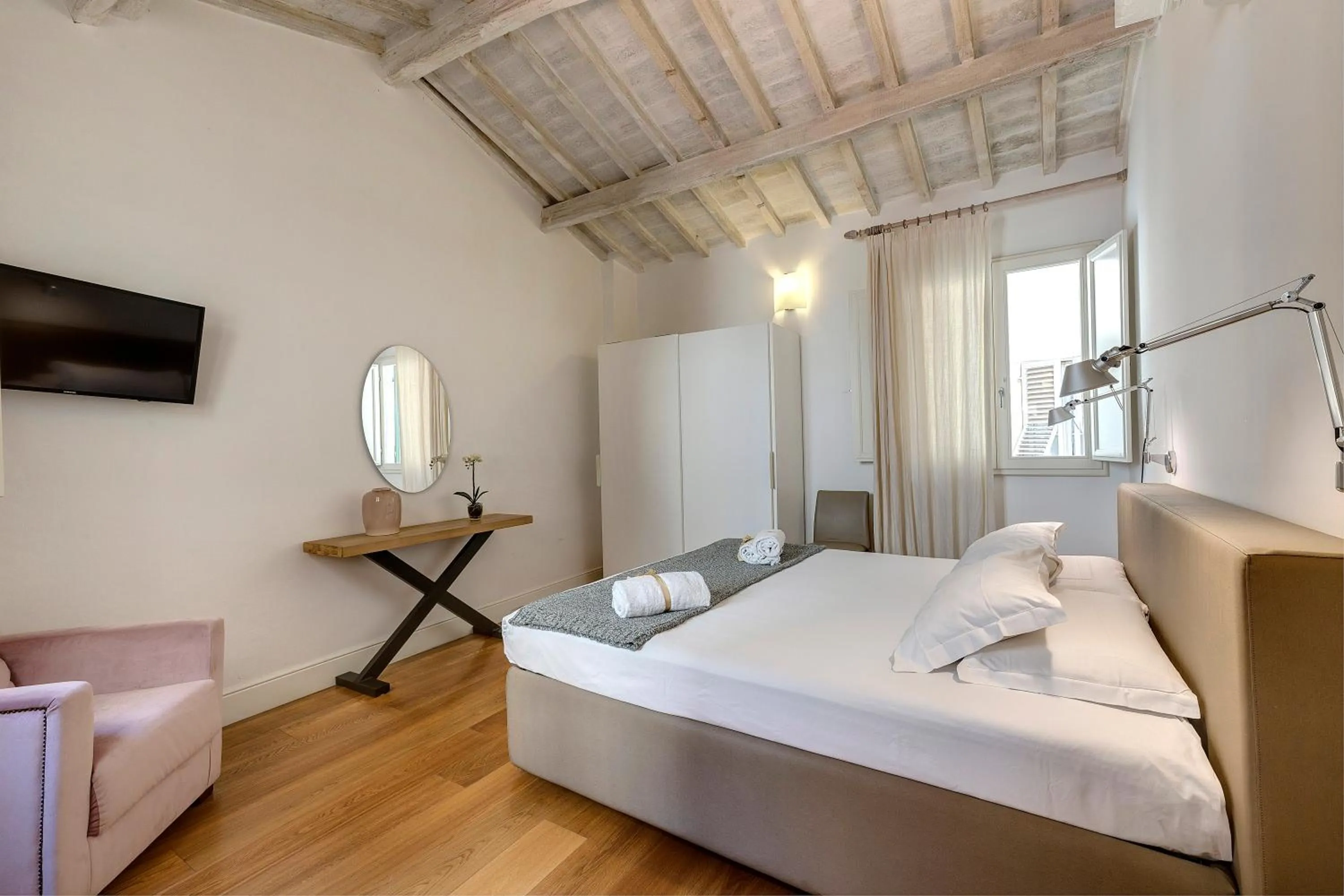 Bedroom, Bed in Tegolaio Apartment by Mamo Florence
