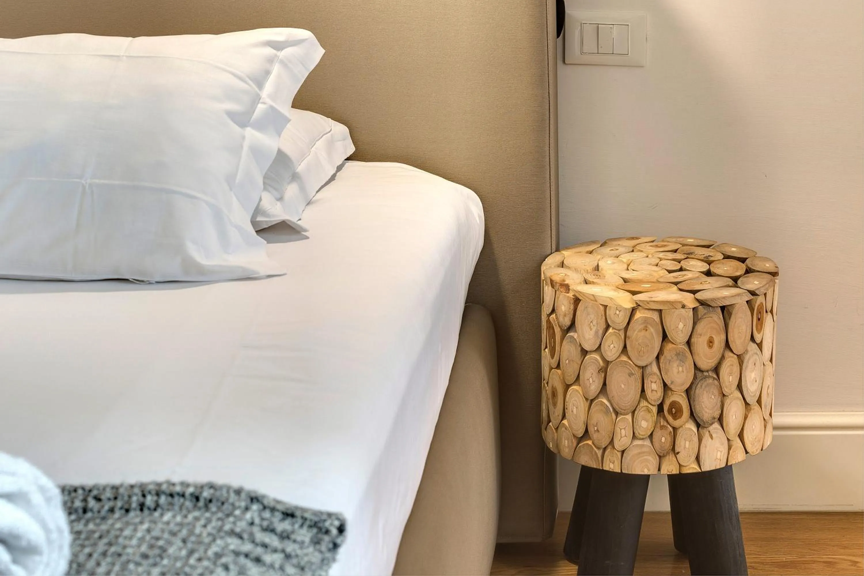 Decorative detail, Bed in Tegolaio Apartment by Mamo Florence