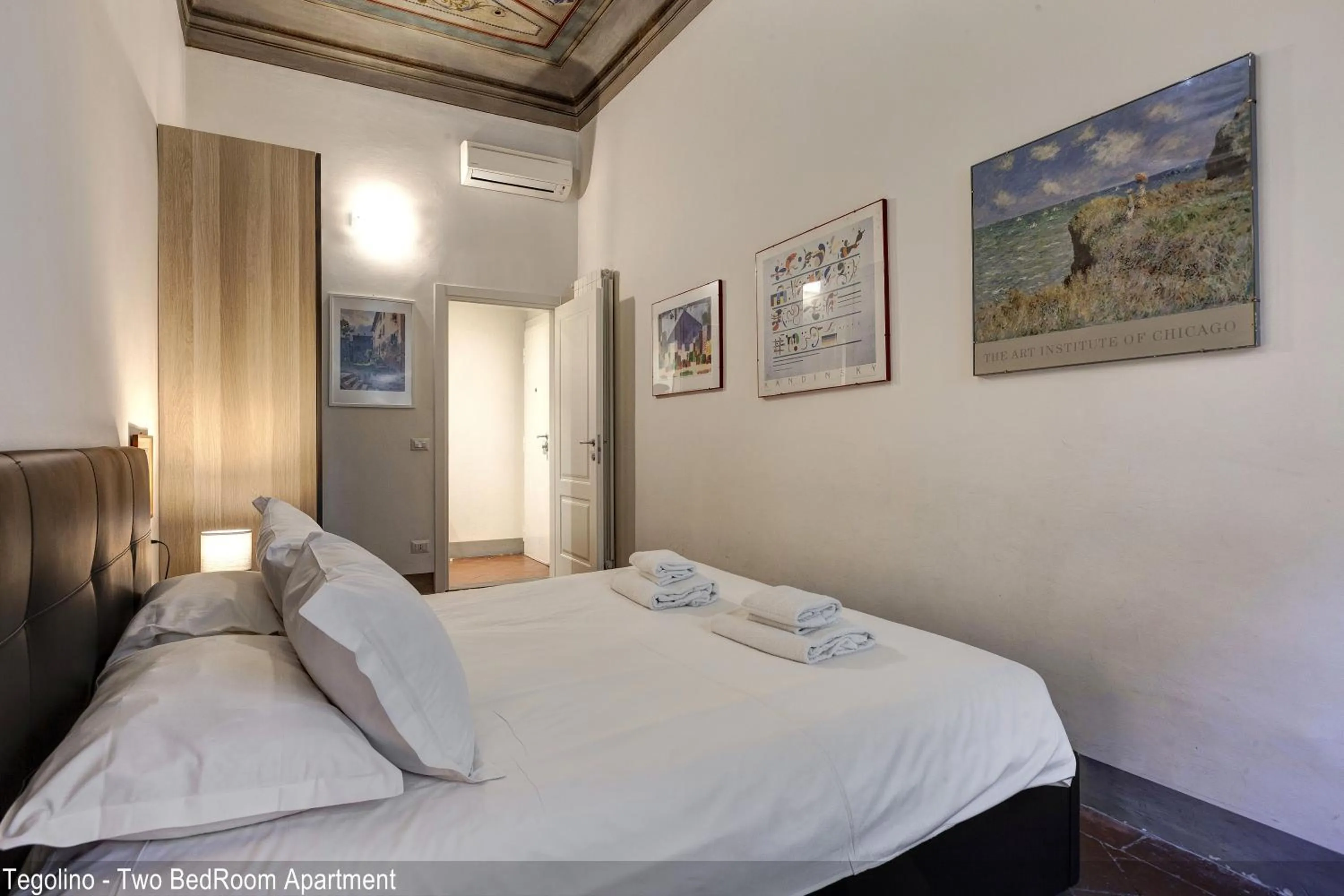 Bedroom, Bed in Tegolaio Apartments by Mamo Florence