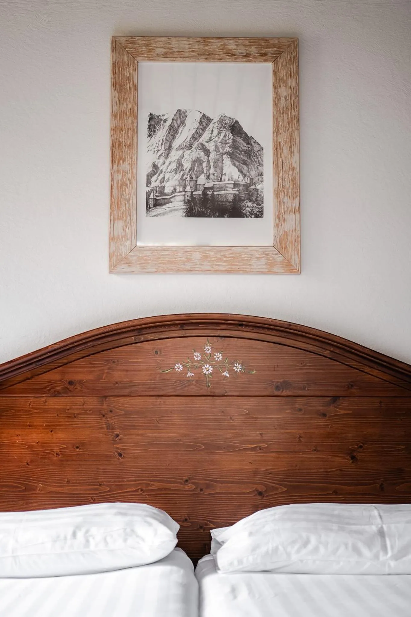 Bed in Hôtel de Gruyères