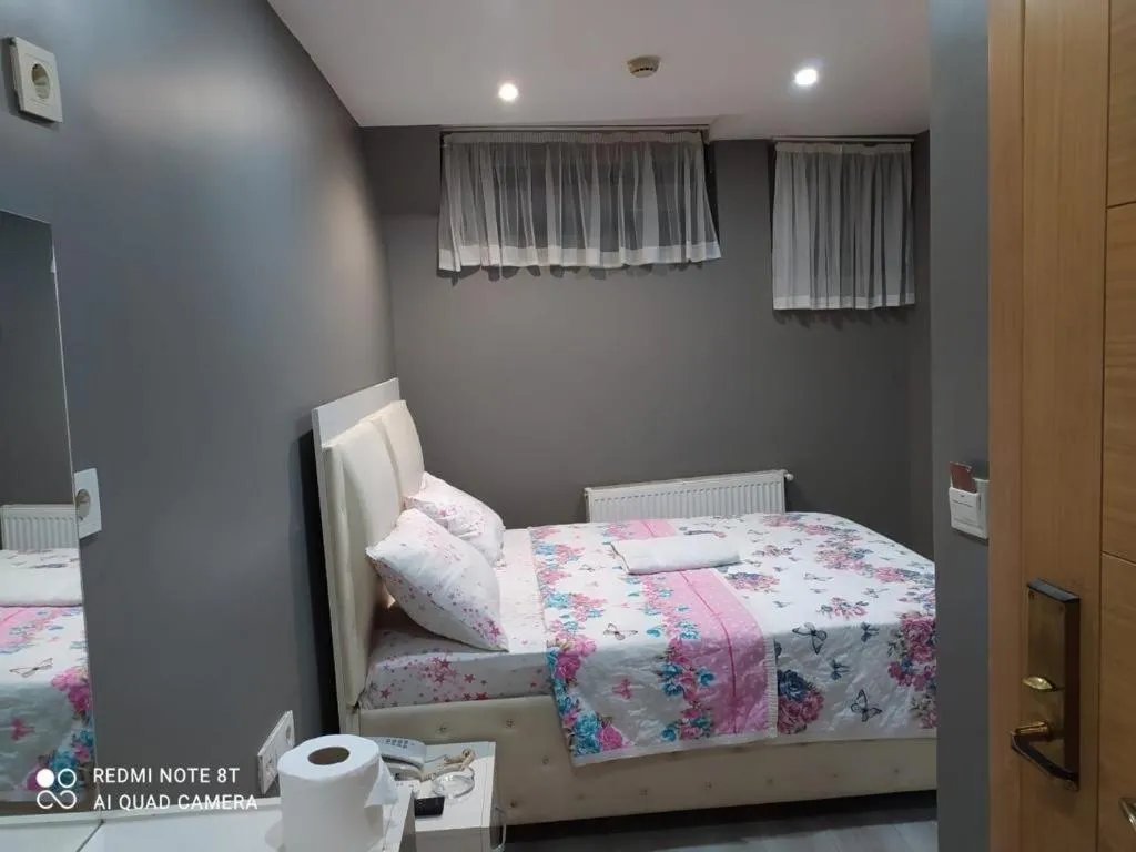 Bed in MYMOON Residence