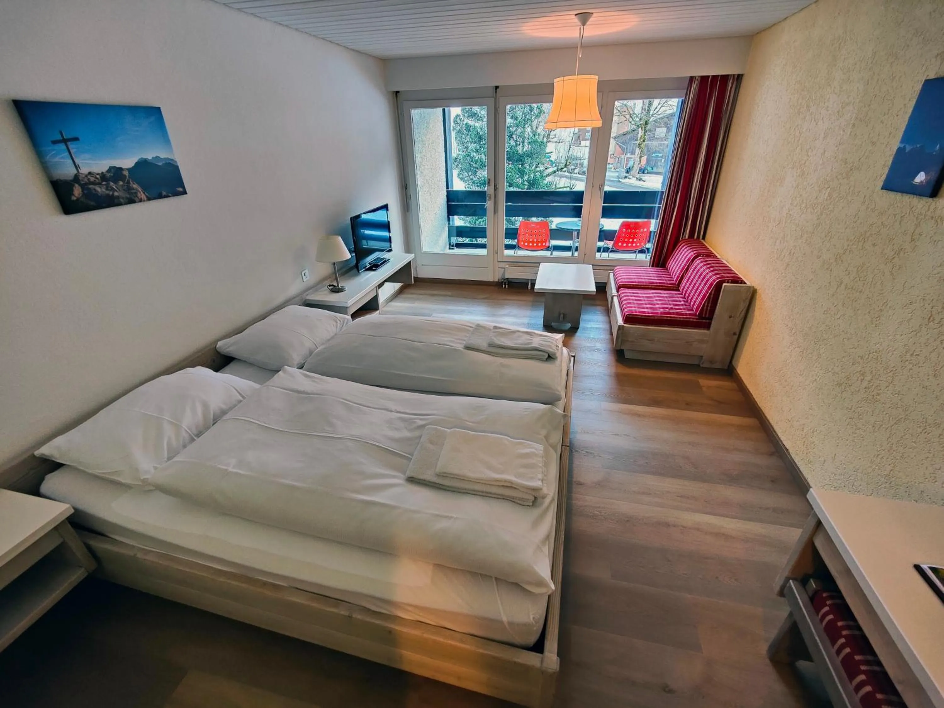 Photo of the whole room, Bed in Hotel Säntis Lodge