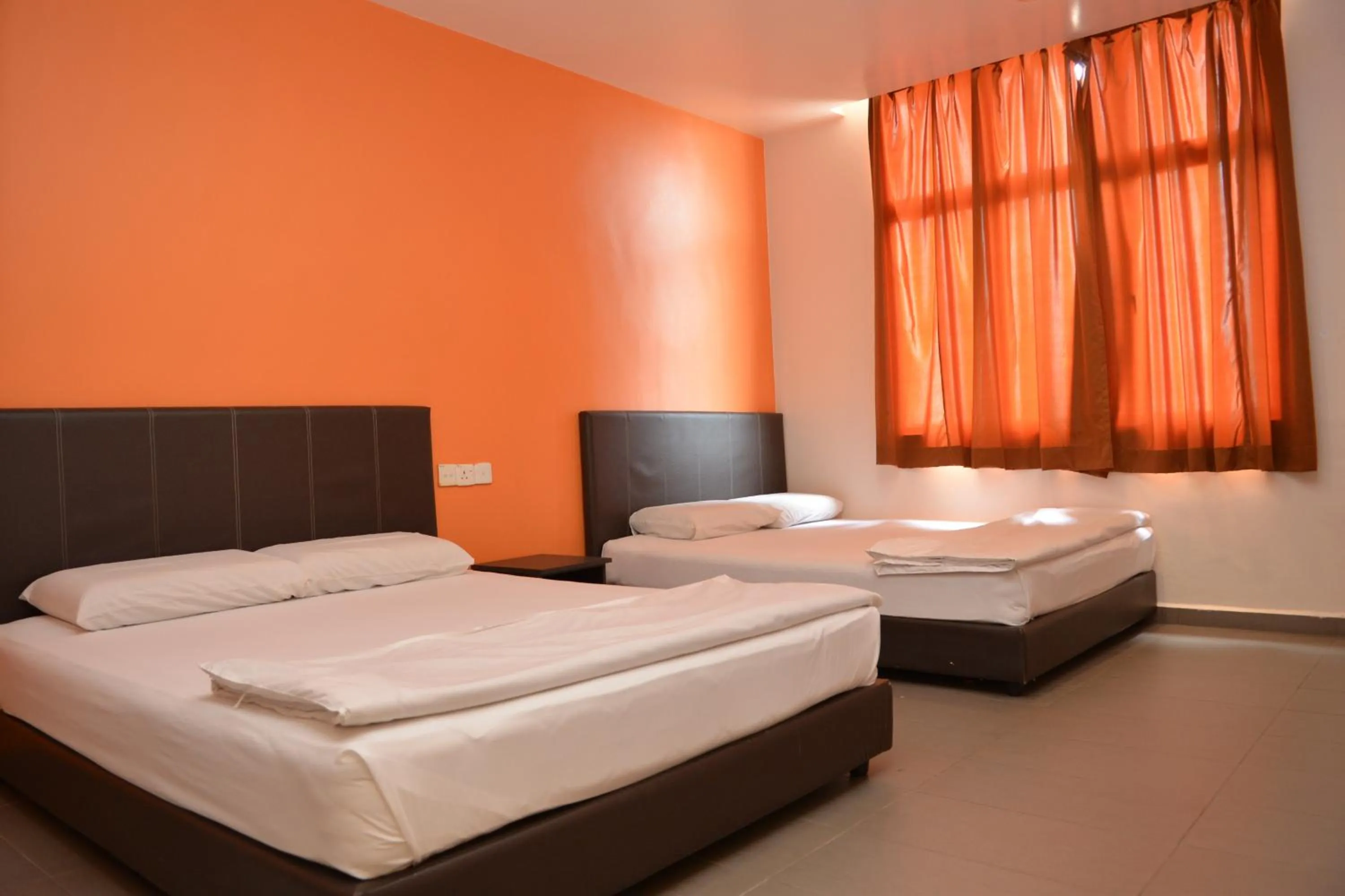 Bed in GF WONDERFUL HOTEL