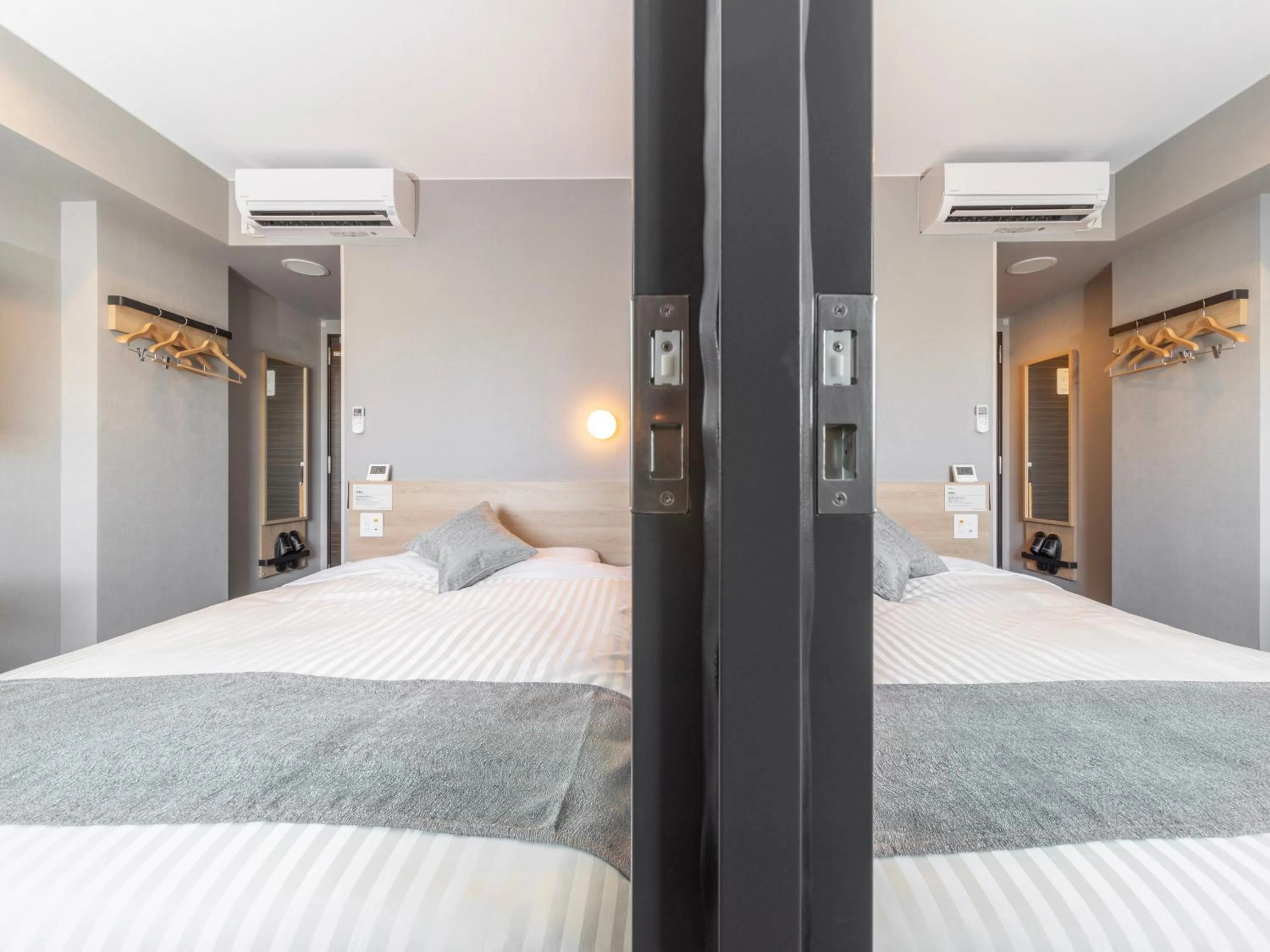 Bed in Super Hotel Premier Kanazawaeki Higashiguchi