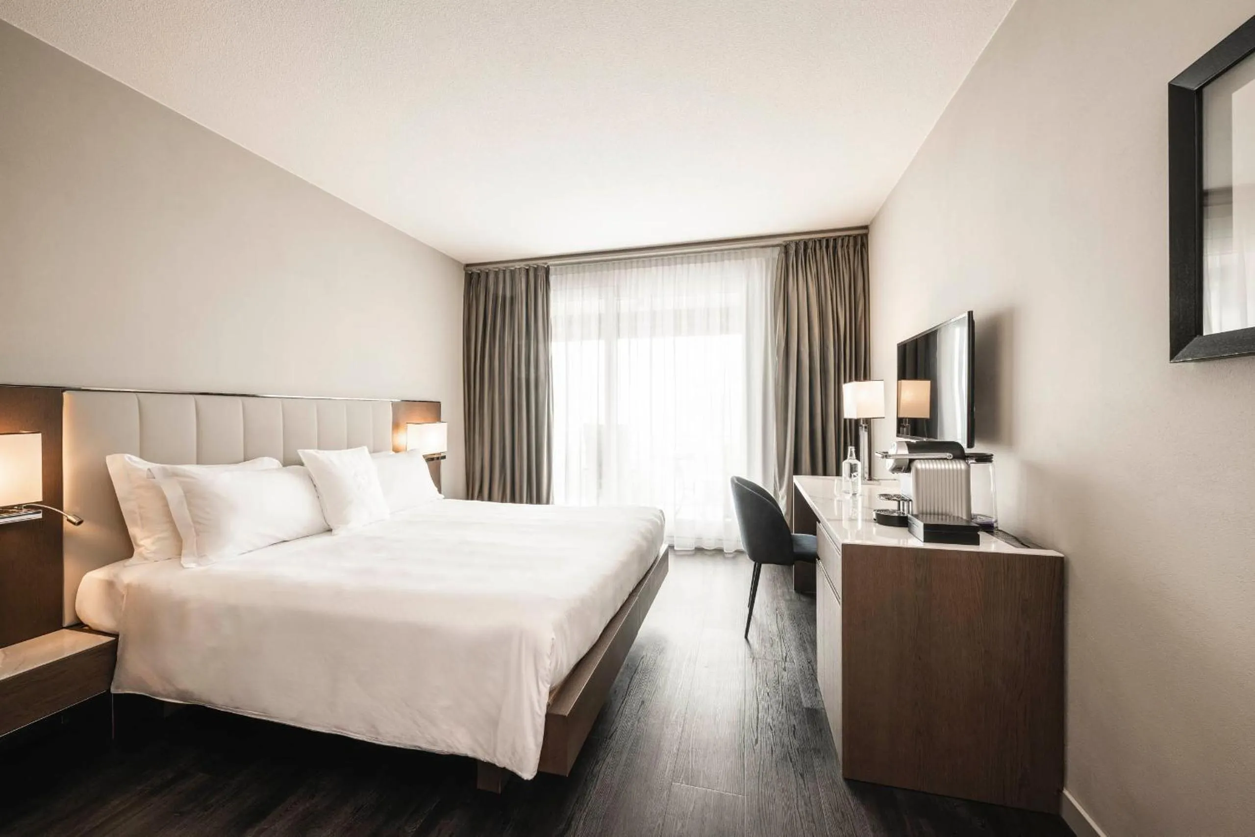 Photo of the whole room, Bed in Hotel Belvedere Locarno