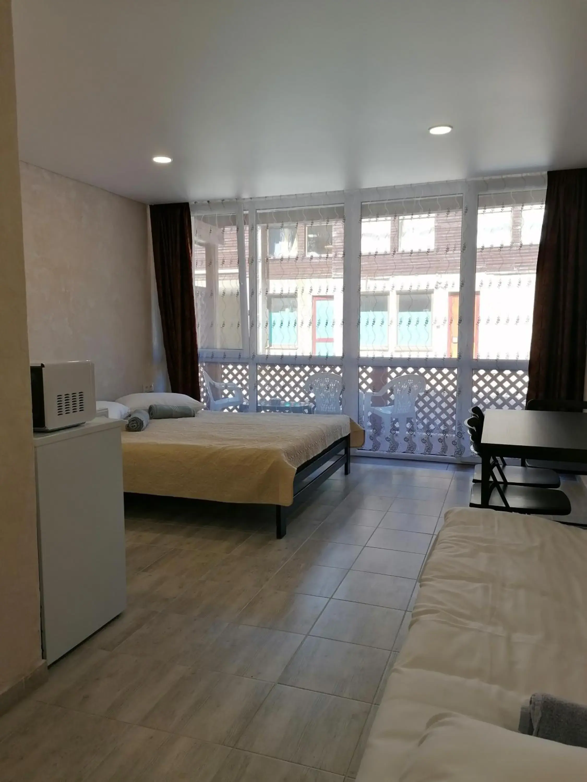 Triple Room with Balcony in Poilsio namai Banga Sventojoje Triple Room with Balcony in Poilsio namai Banga Sventojoje