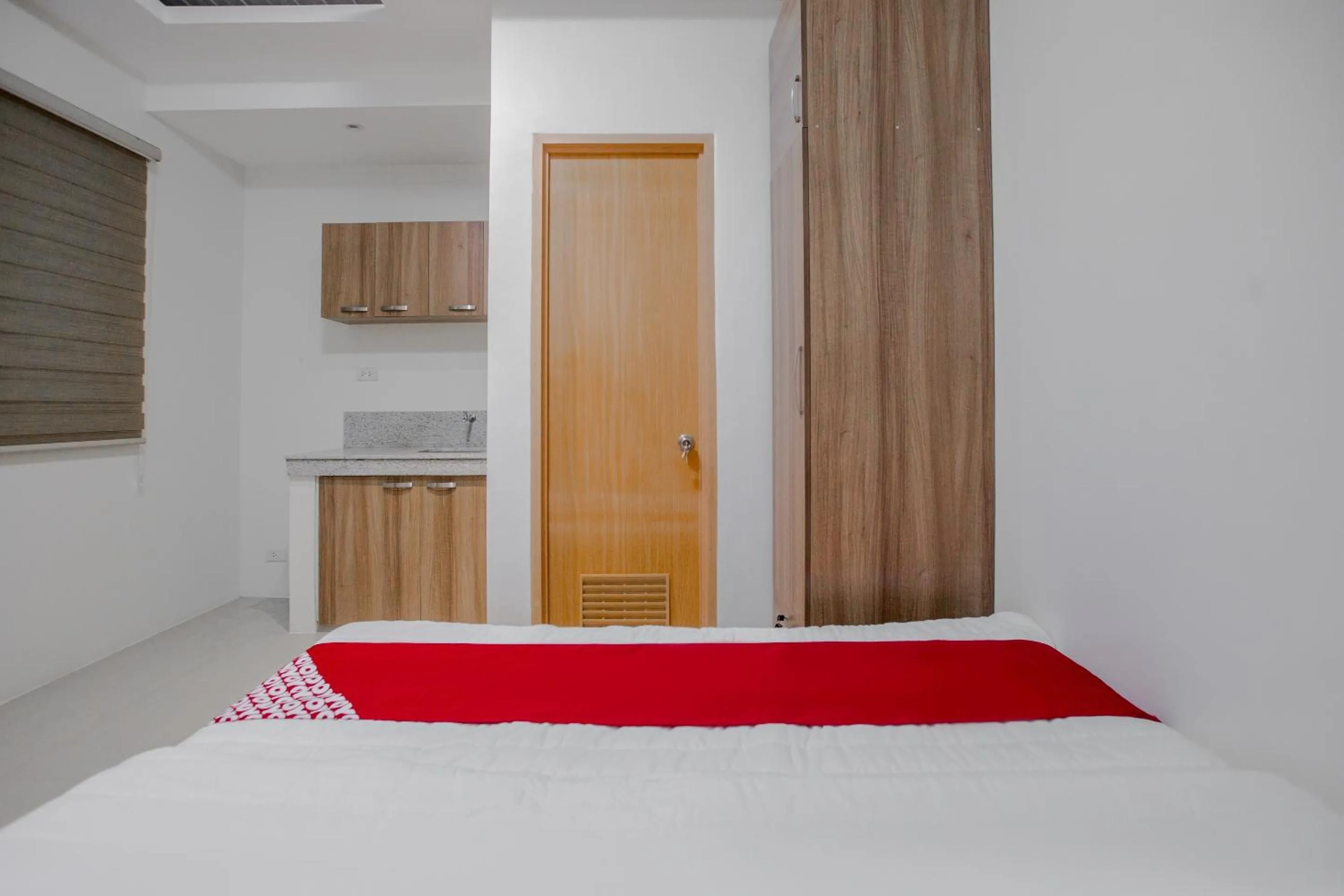 Bedroom in OYO 605 The Quarters