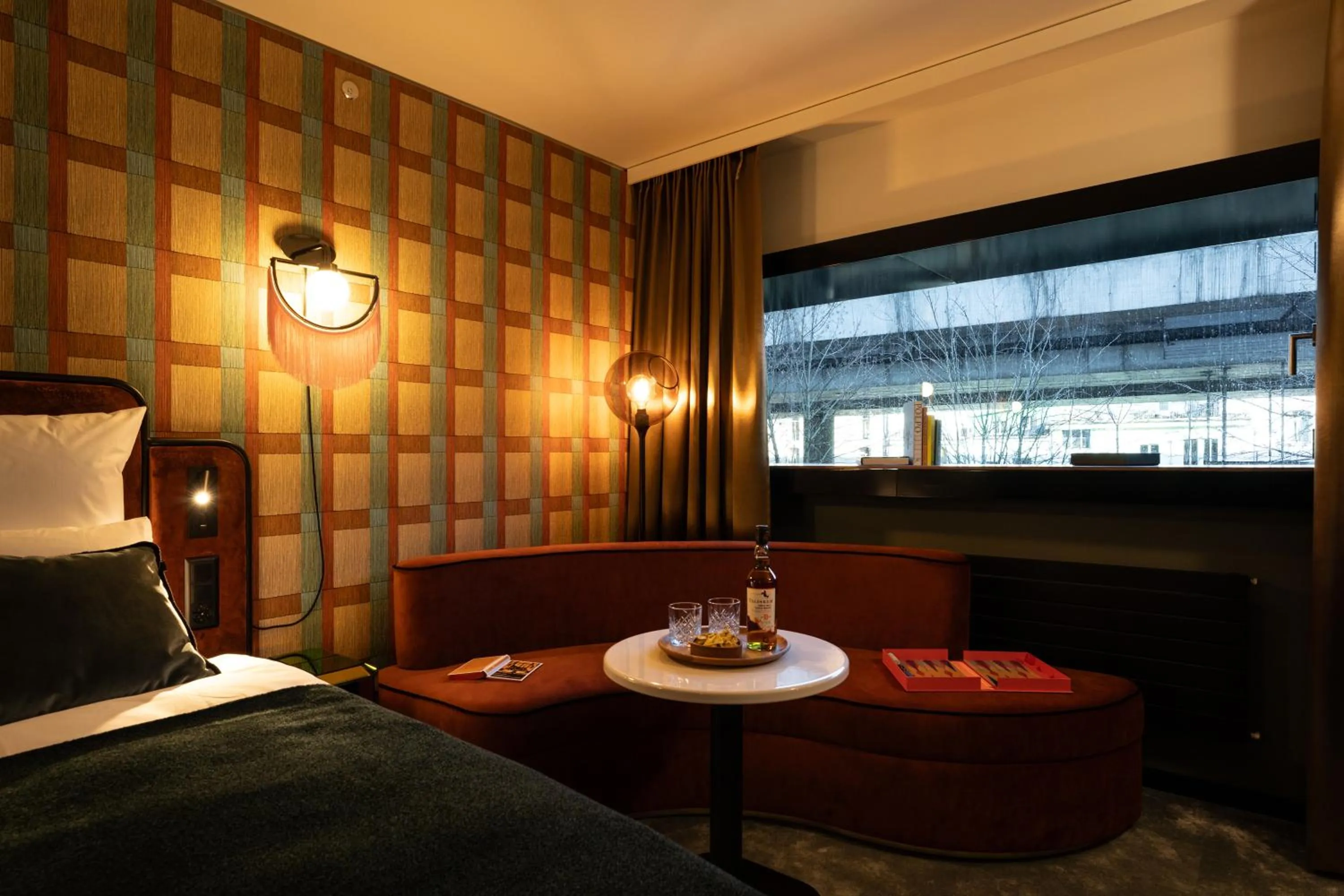 Living room, Bed in The Home Hotel Zürich - a member of DESIGN HOTELS