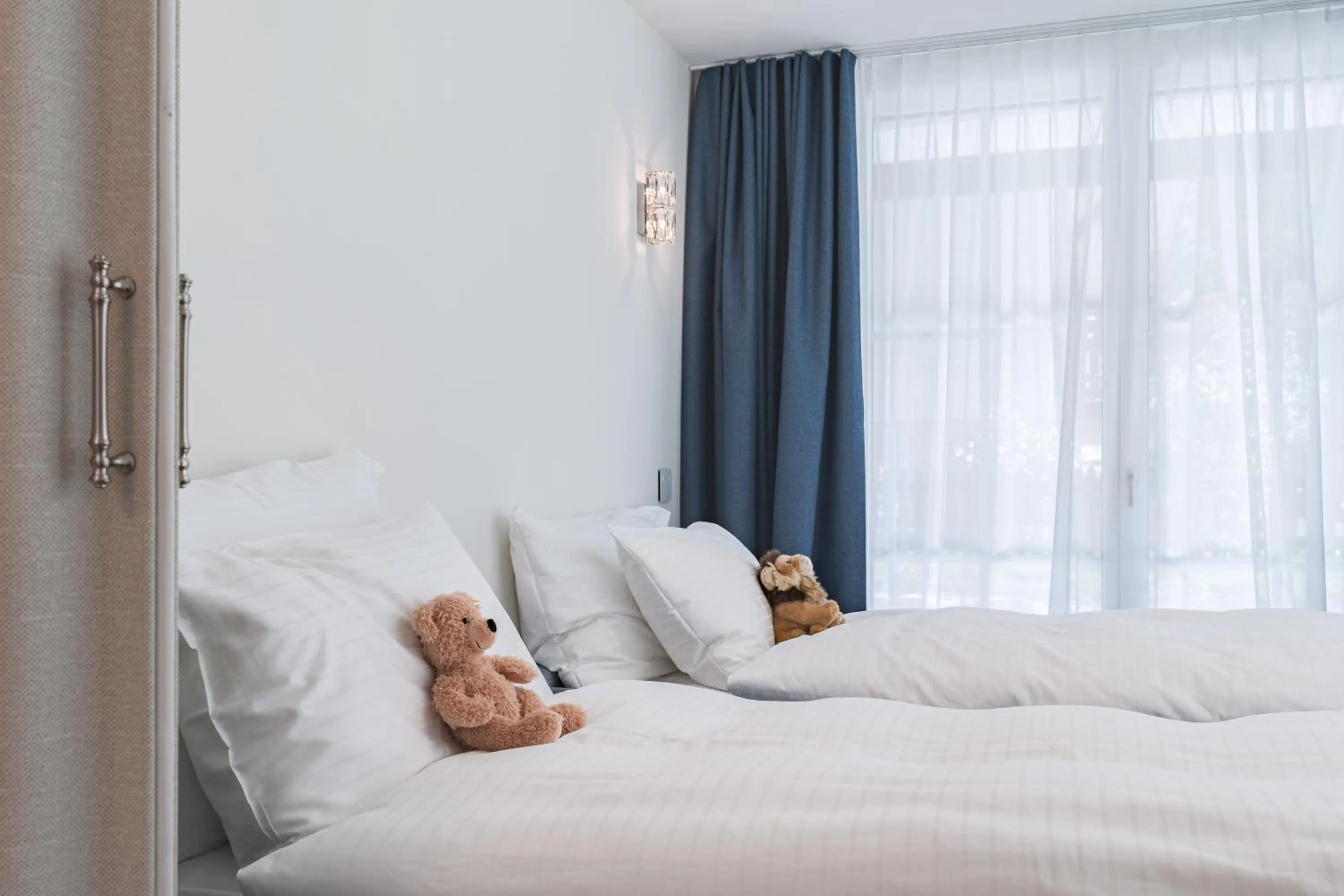 Bed in Le Mirabeau Resort & Spa