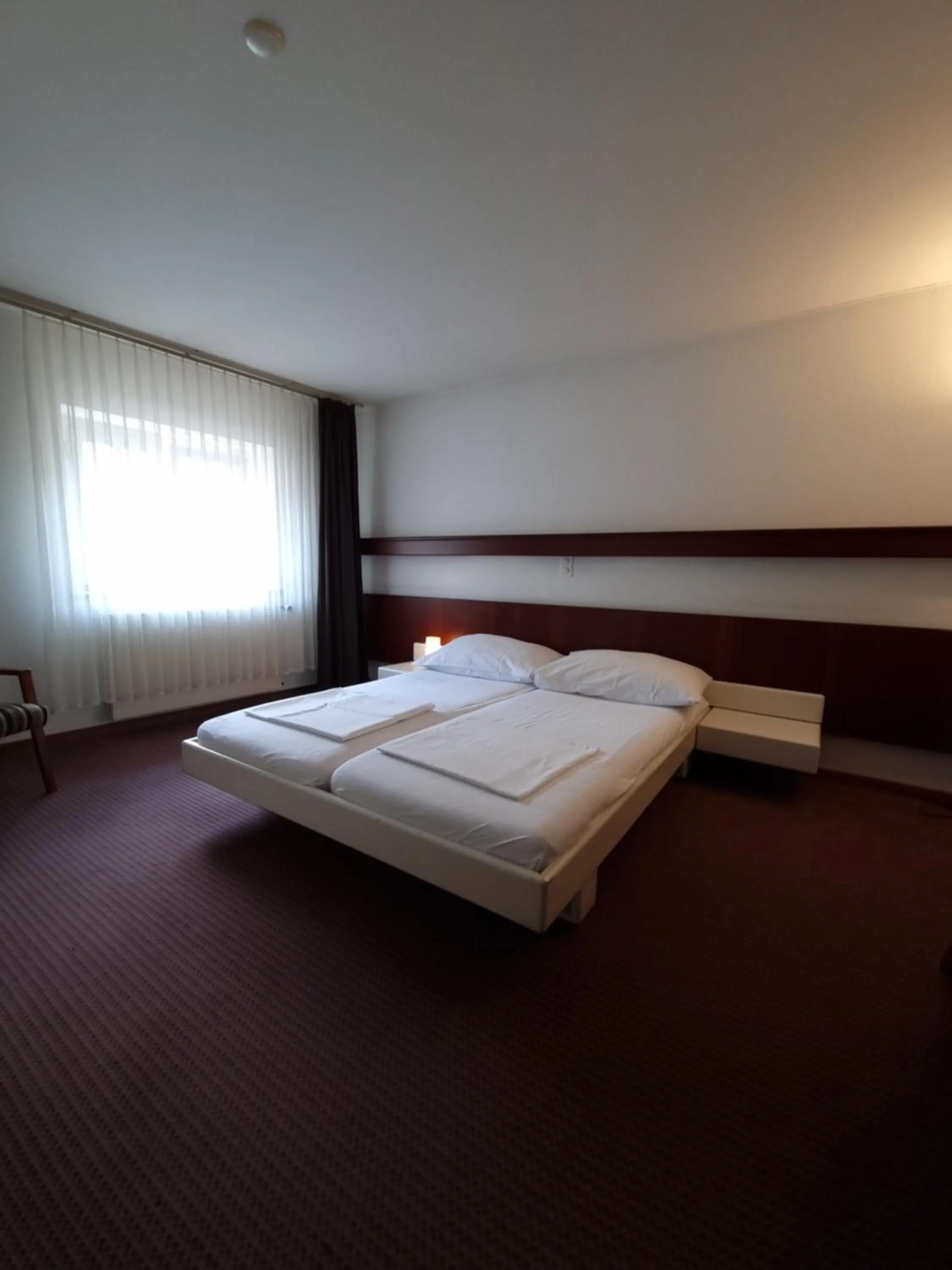 Bed in Spalenbrunnen Hotel & Restaurant Basel City Center