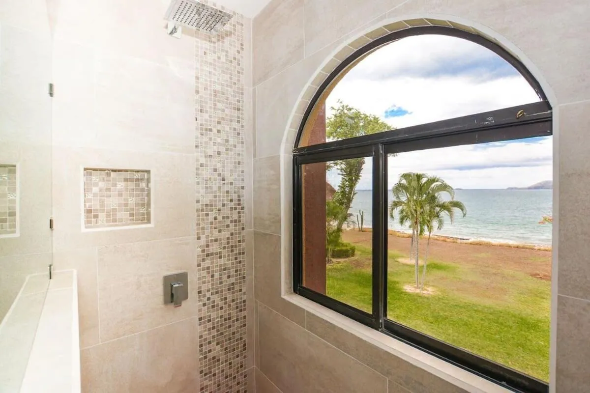 Elegant 3BR Beachfront Condo with Spacious Interior, Ocean-View Terrace & Direct Access to Playa Flamingo