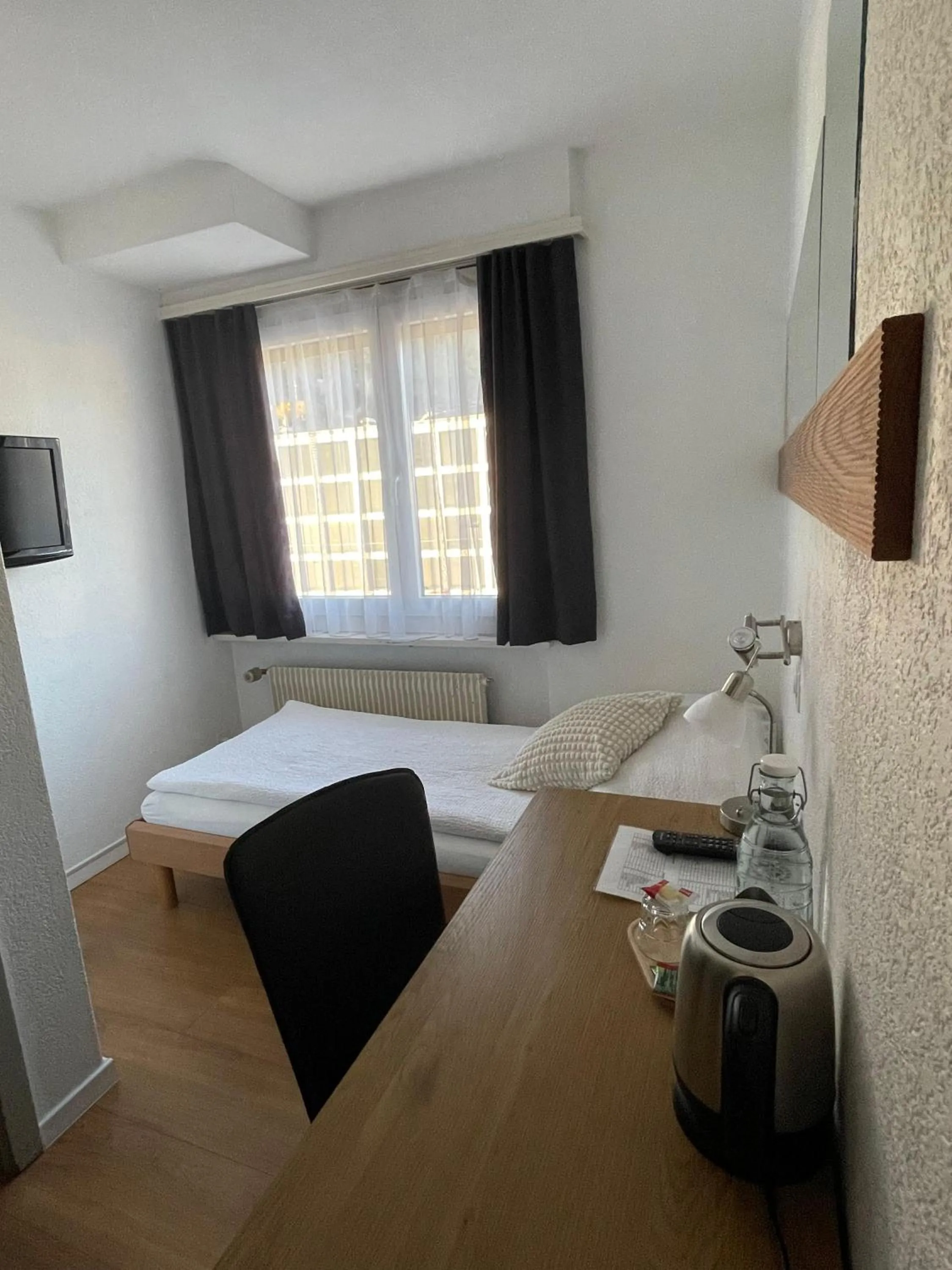 Bed in Hotel Europe Brig