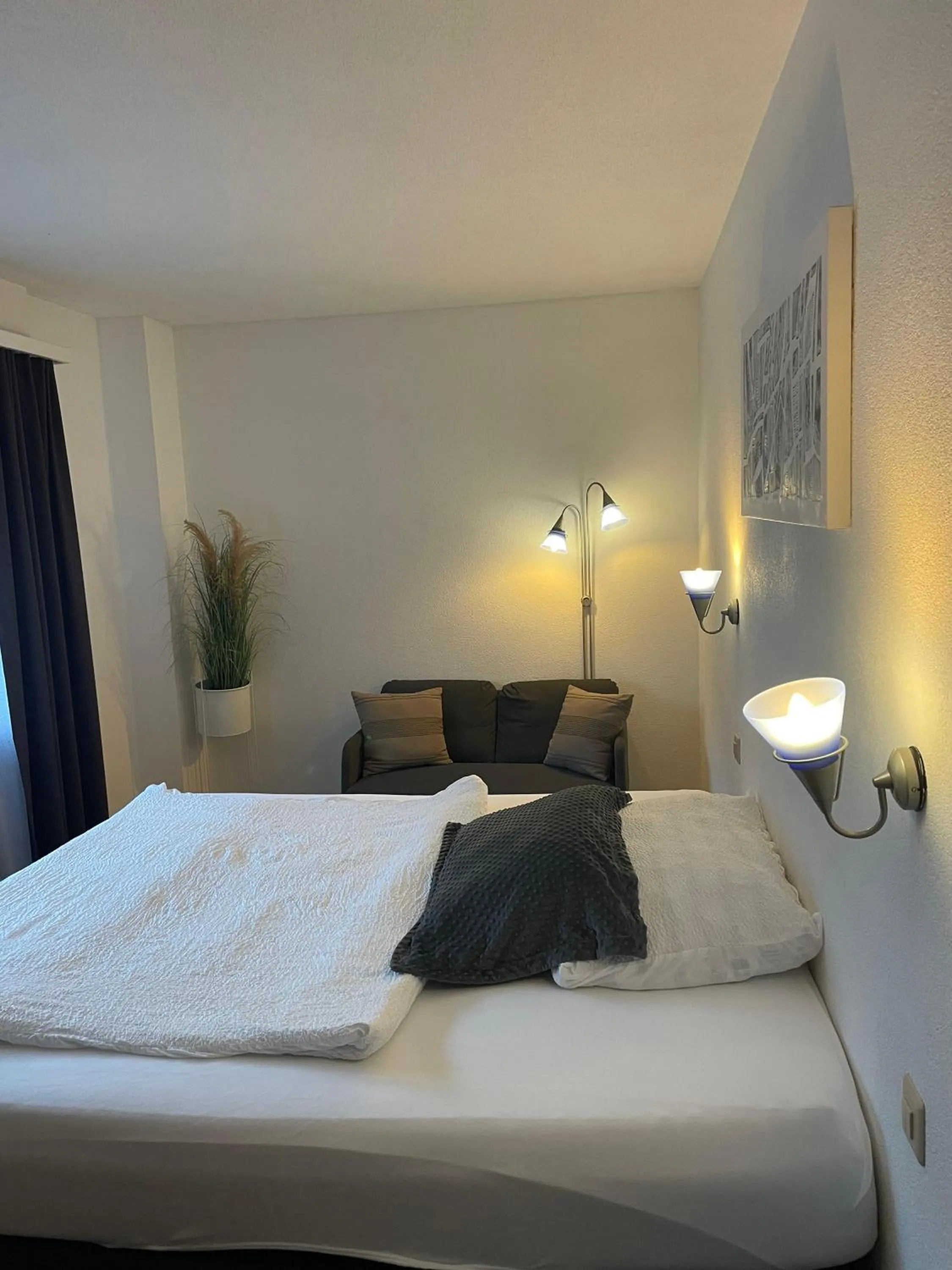 Bed in Hotel Europe Brig