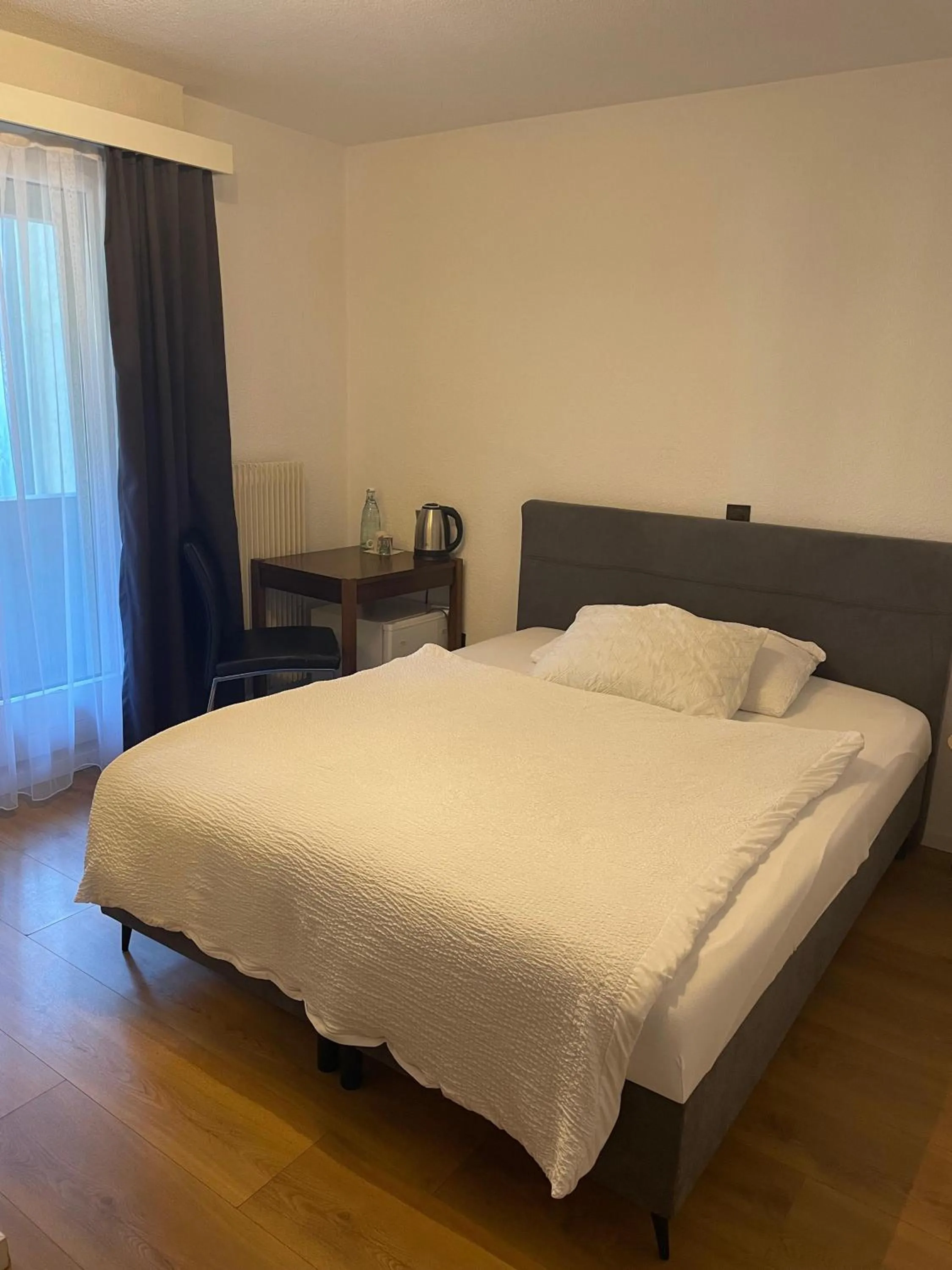 Bed in Hotel Europe Brig