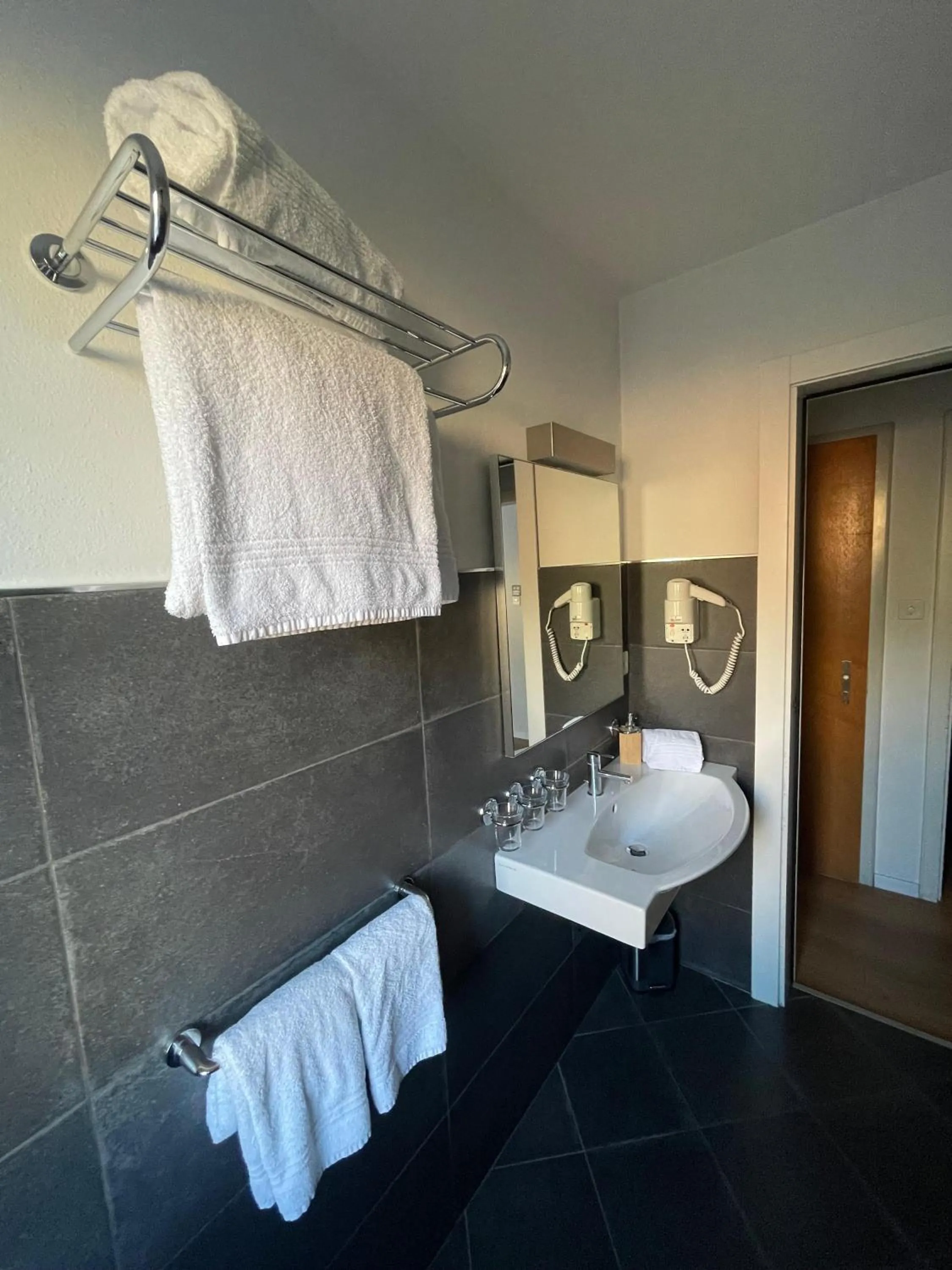 Bathroom in Hotel Europe Brig