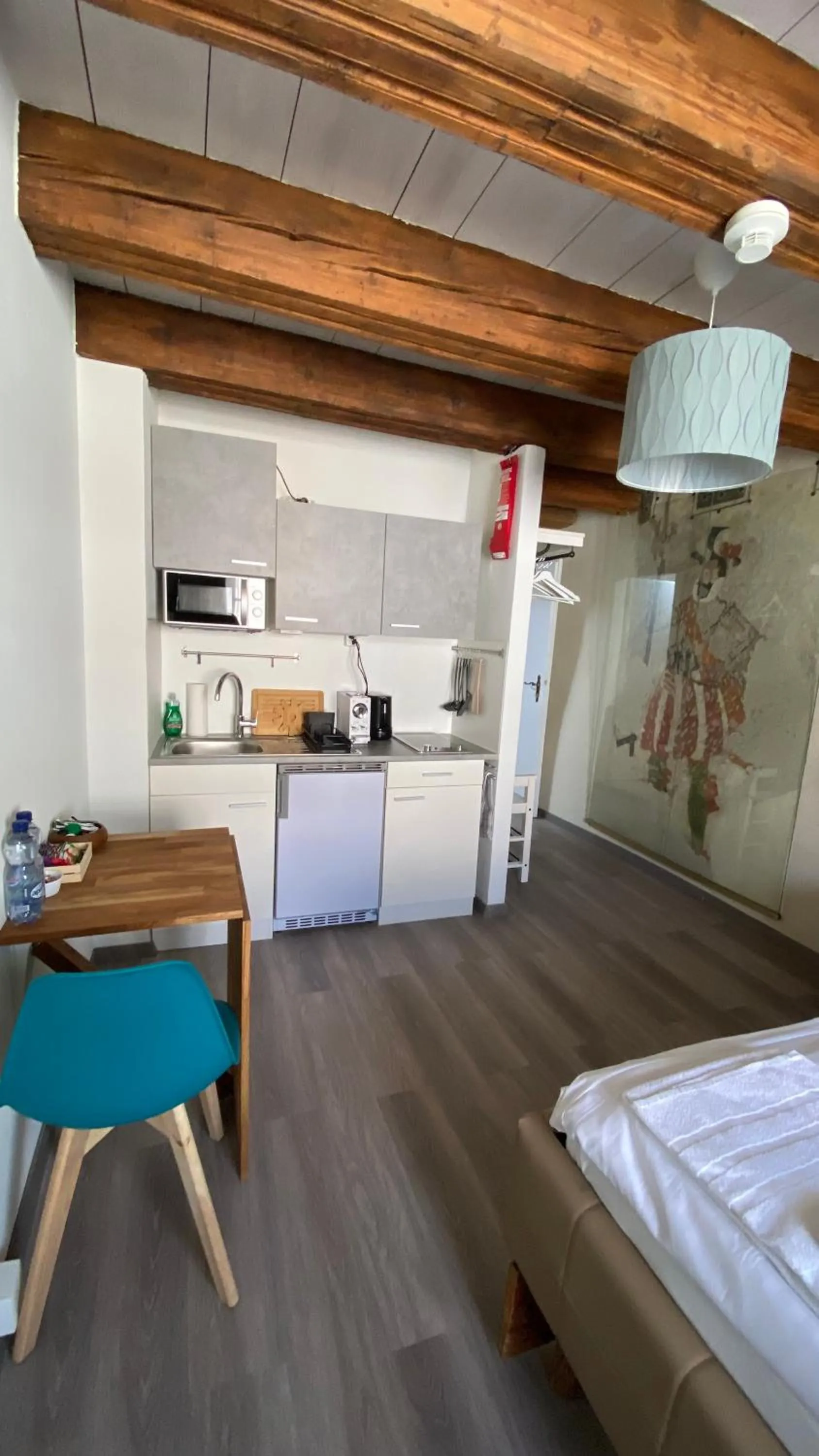 Bed in Aux chambres du Banneret