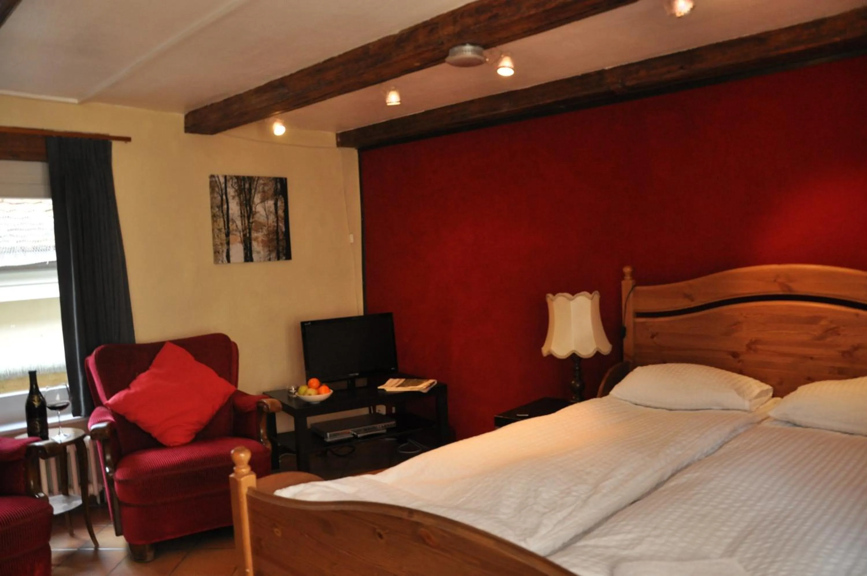 Bed in Aux chambres du Banneret