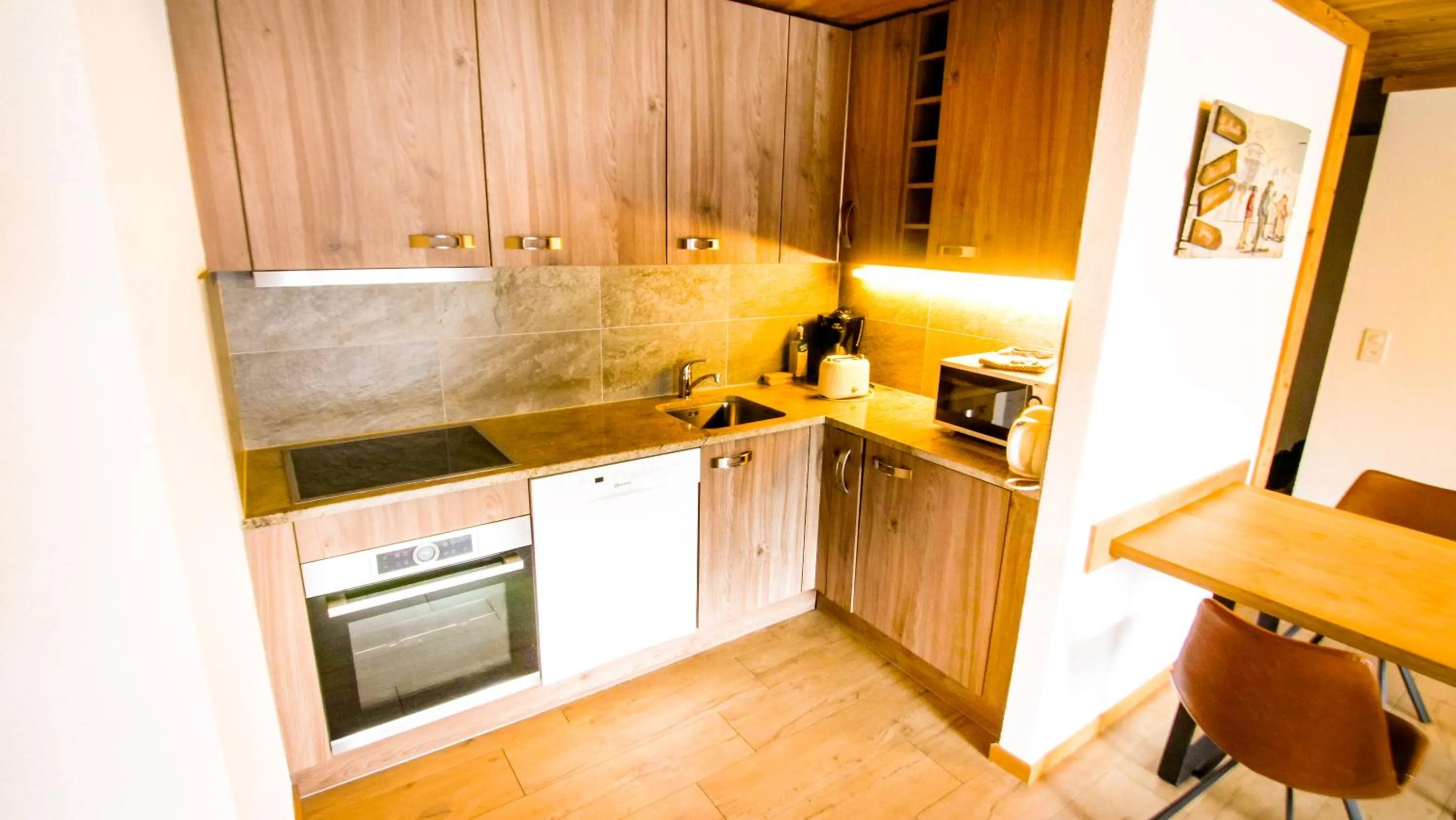 Kitchen or kitchenette in Hotel Central Résidence