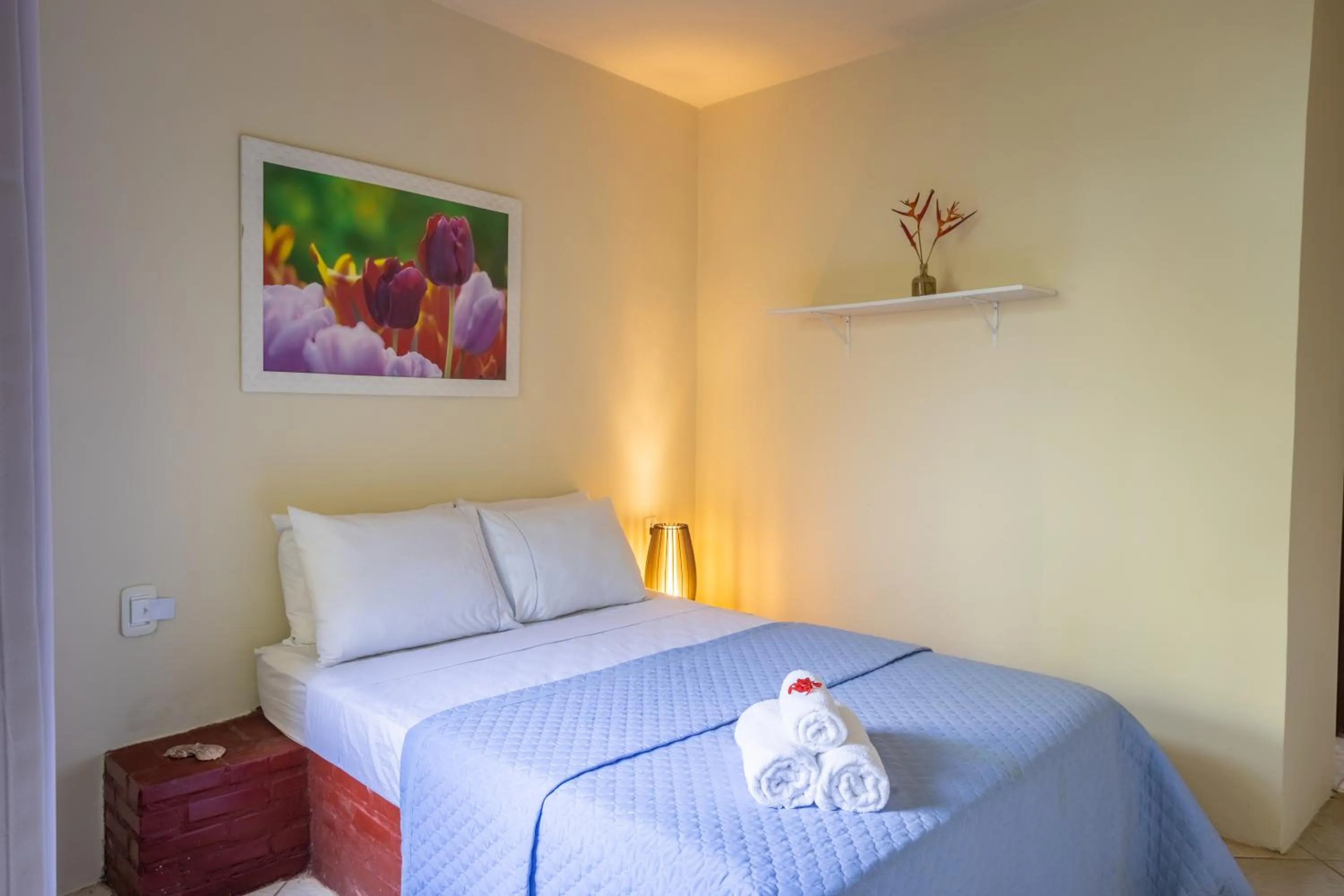 Bed in Pousada Cruzoé