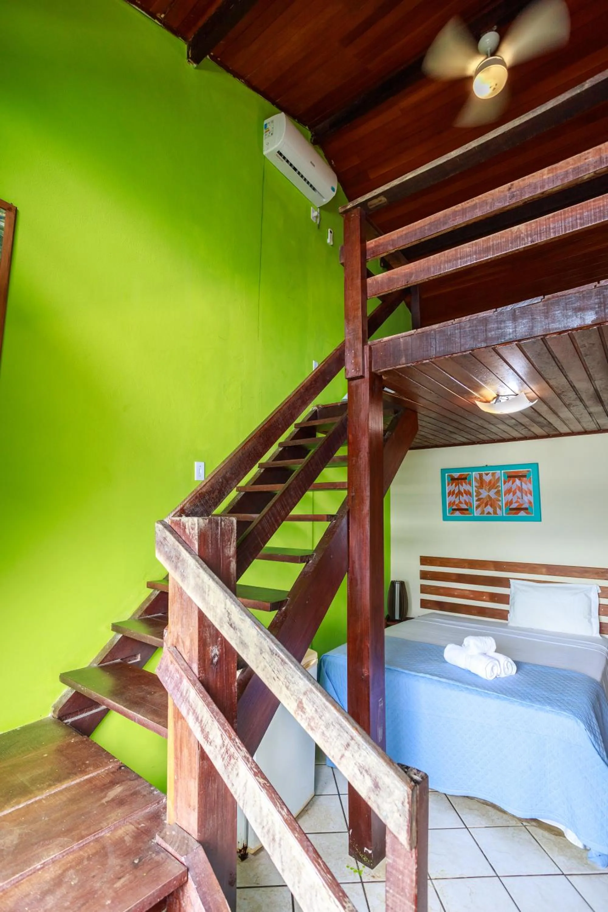 Bed in Pousada Cruzoé