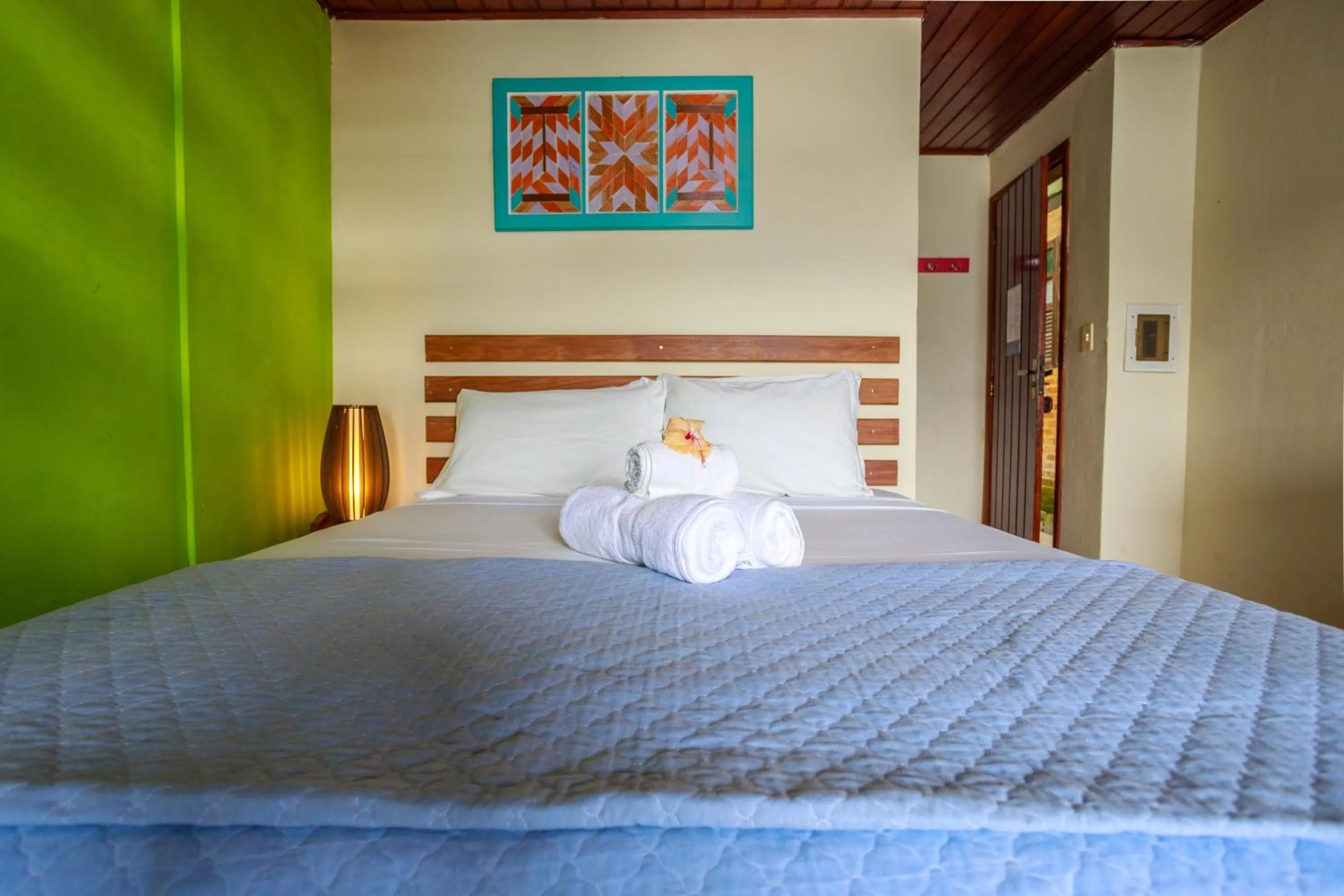 Bed in Pousada Cruzoé