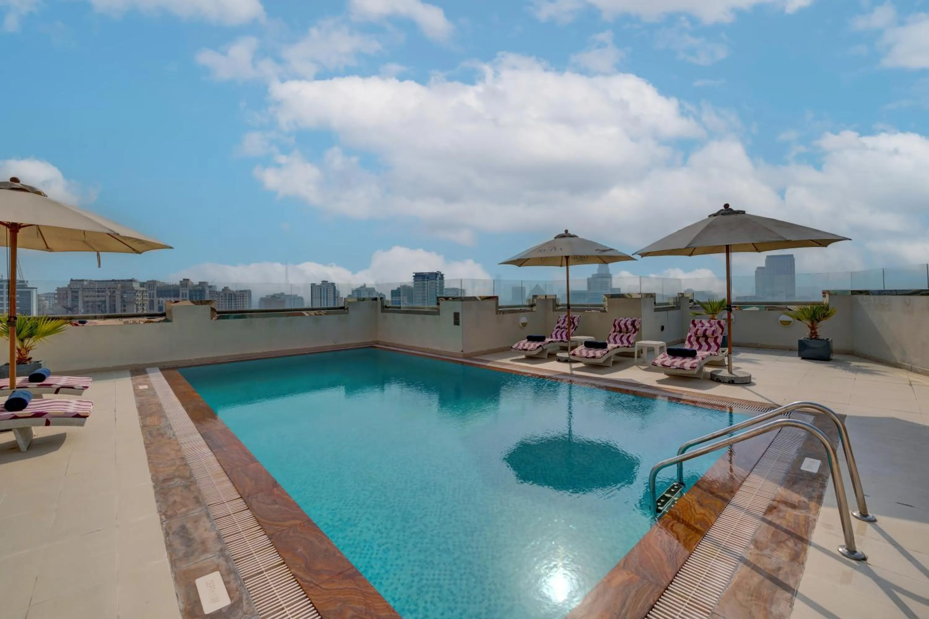 Swimming pool in SUHA Park Hotel Apartments, Waterfront Jaddaf