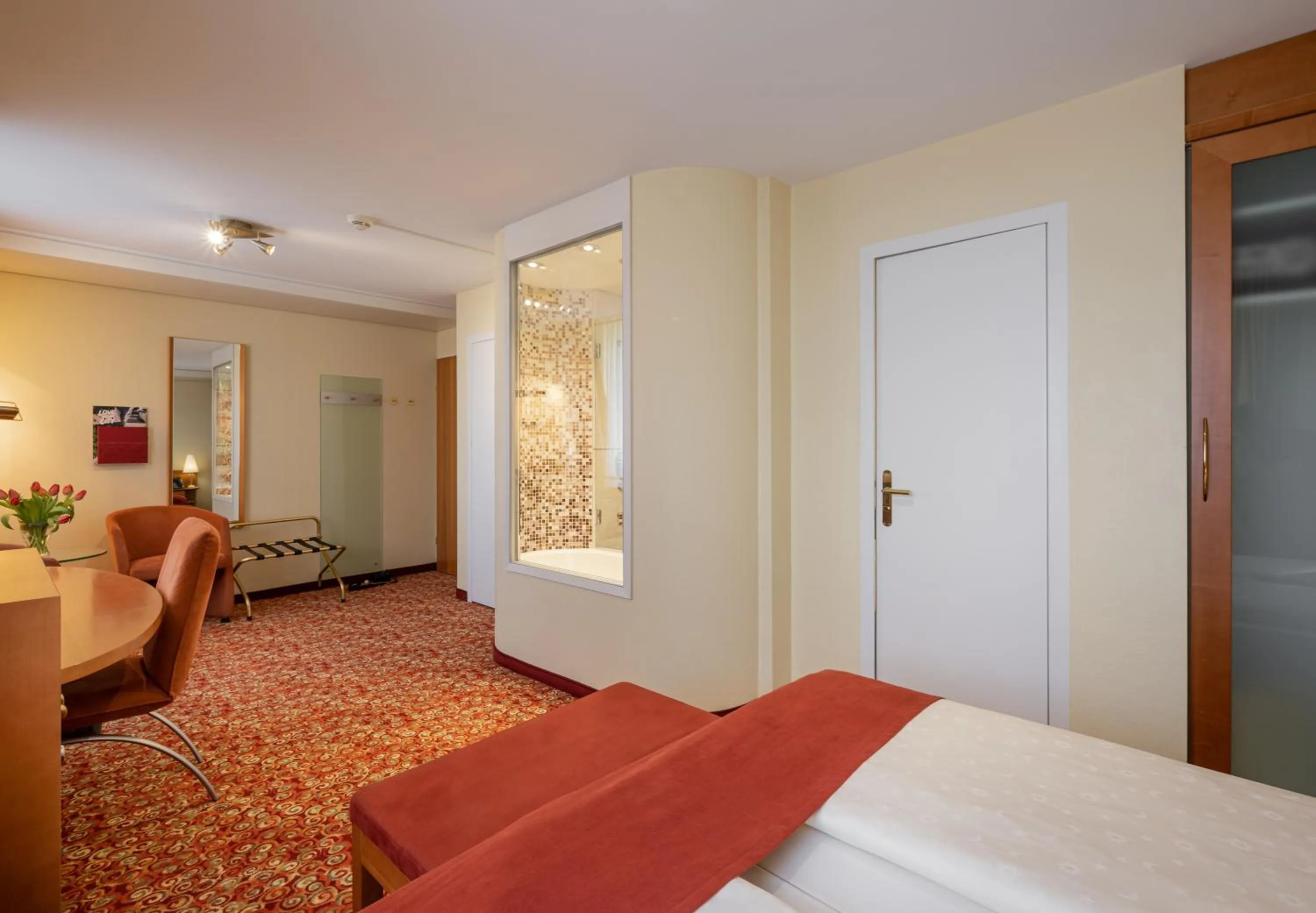 Living room, Bed in GAIA Hotel Basel - the sustainable 4 star hotel