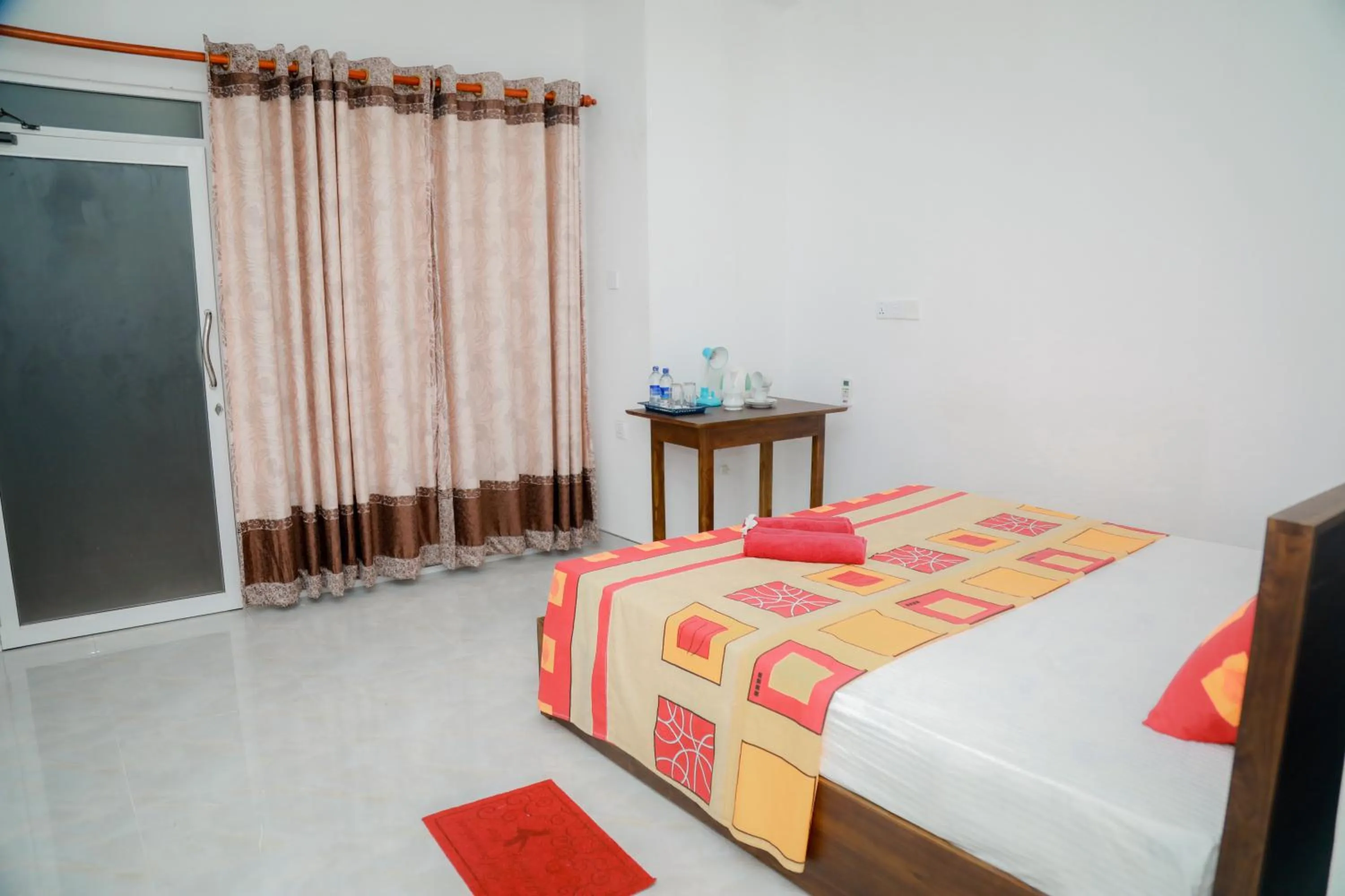 Bed in Araliya Lagoon Park Resort